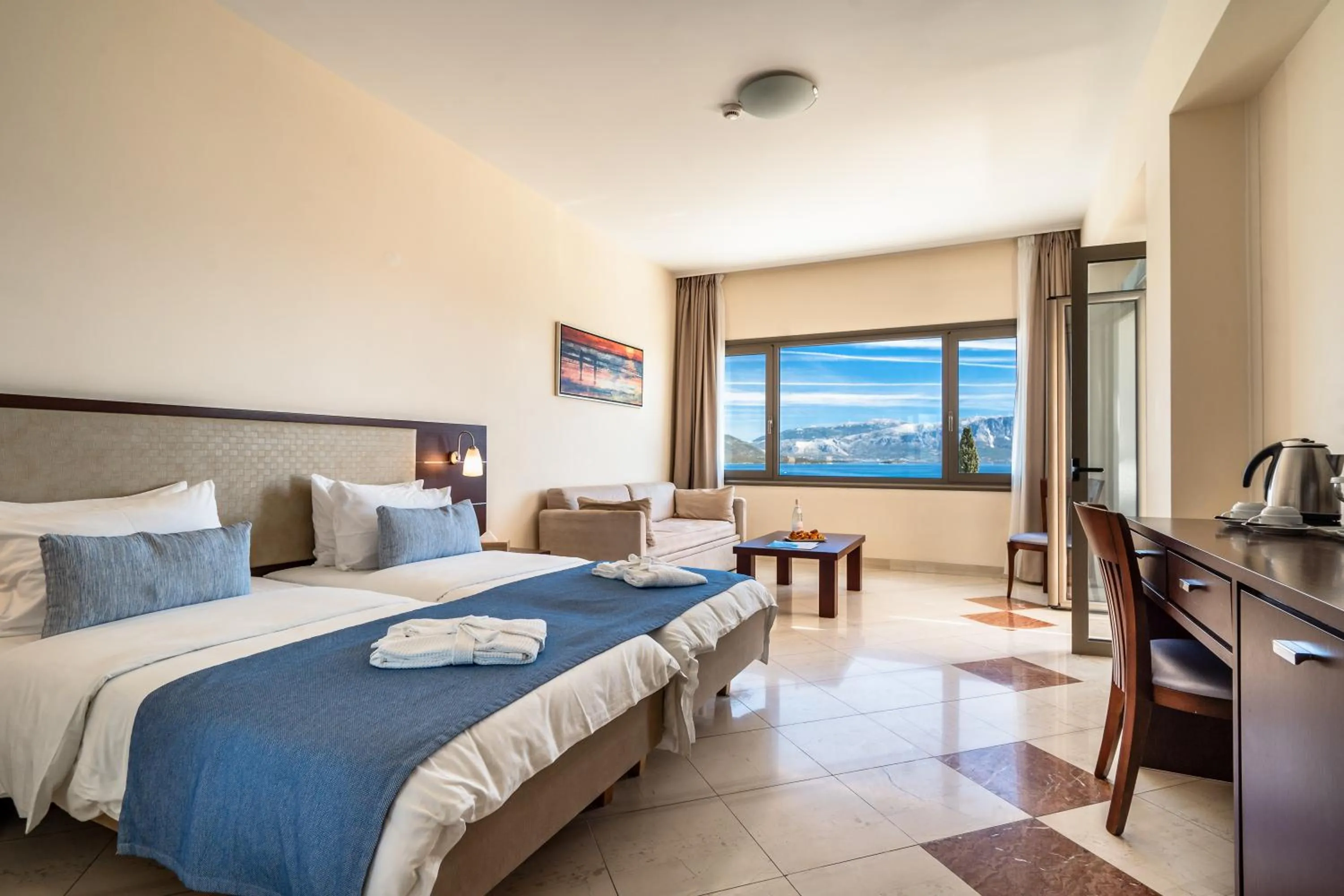 Bed in Porto Galini Seaside Resort & Spa