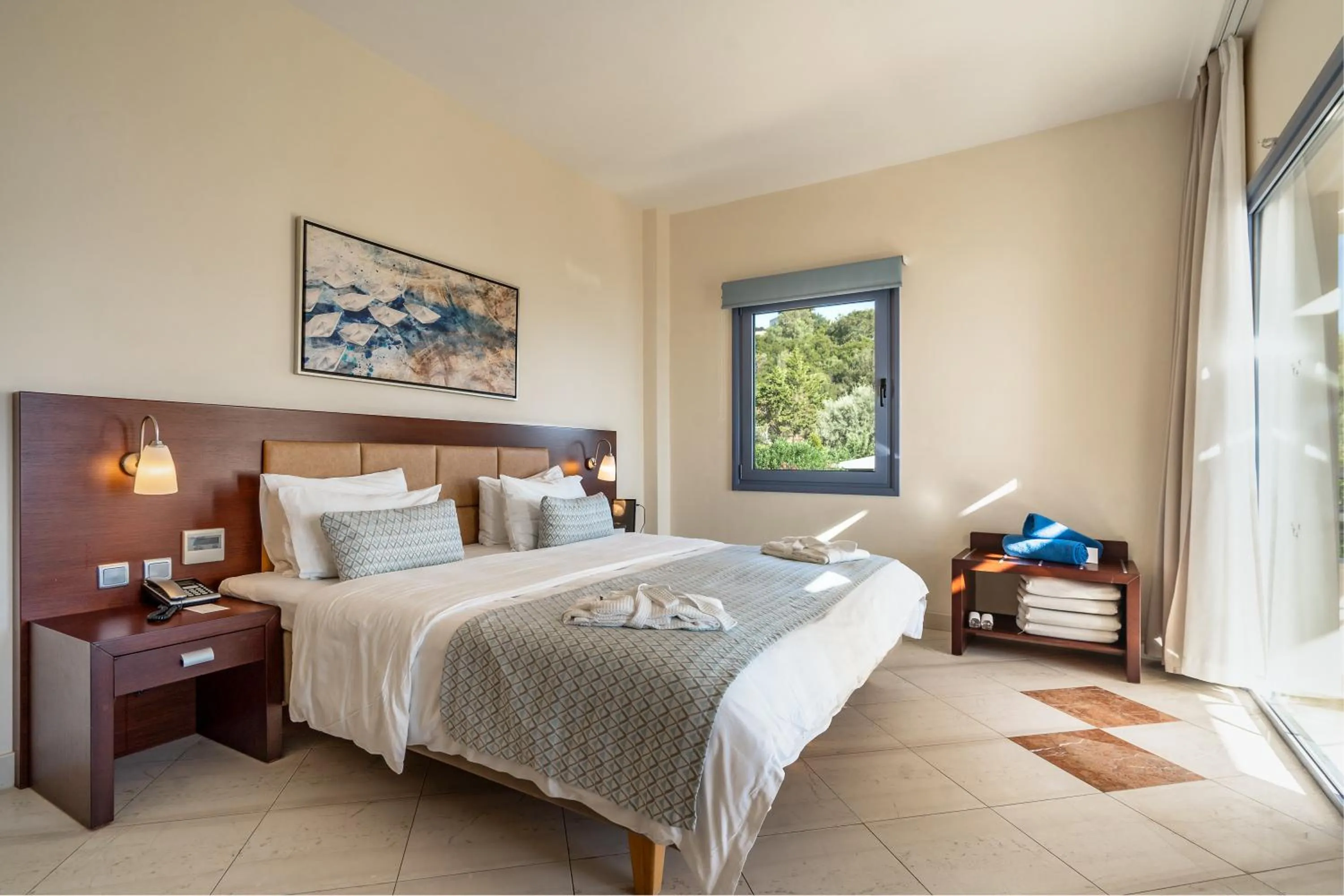 Bed in Porto Galini Seaside Resort & Spa