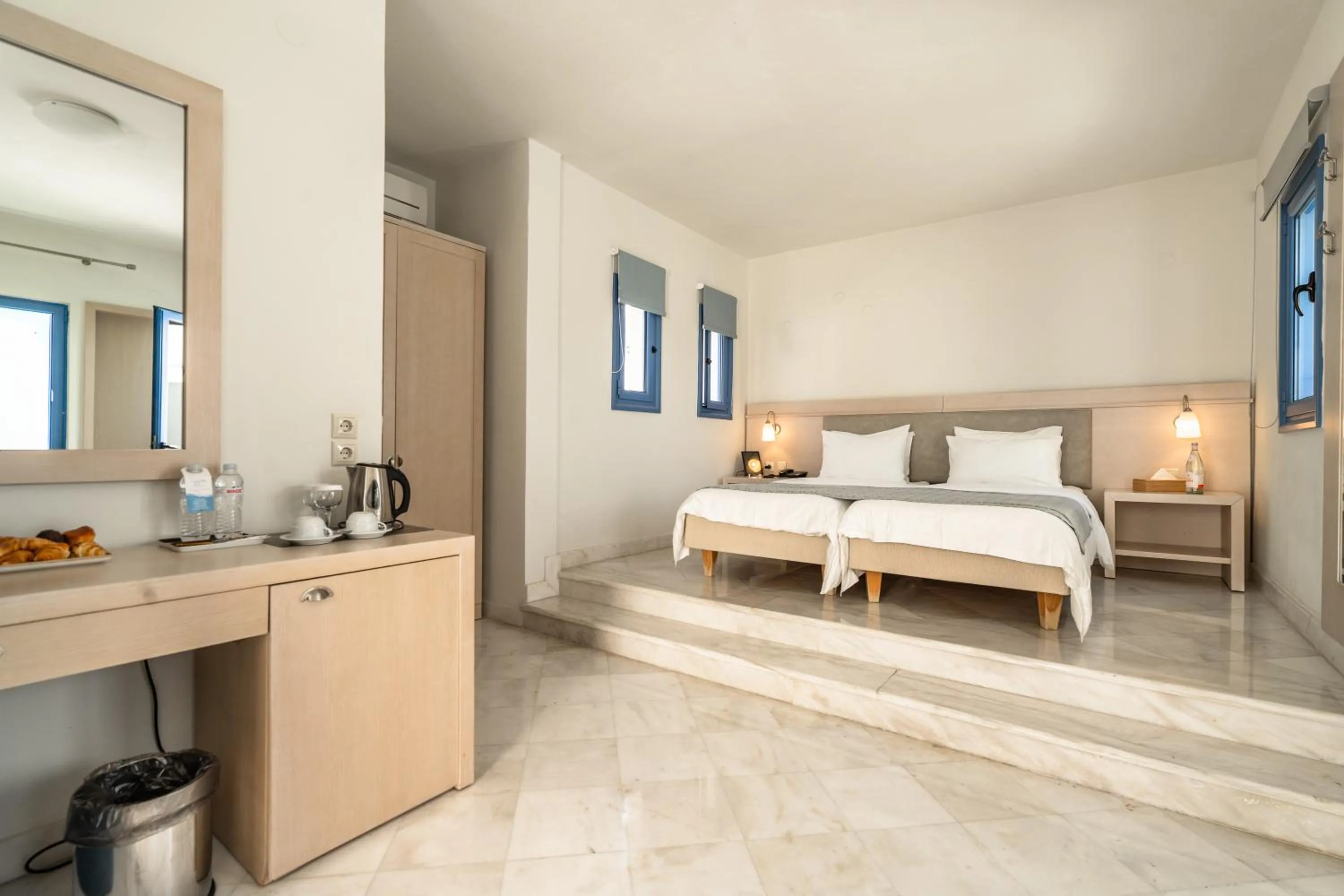 Bed in Porto Galini Seaside Resort & Spa