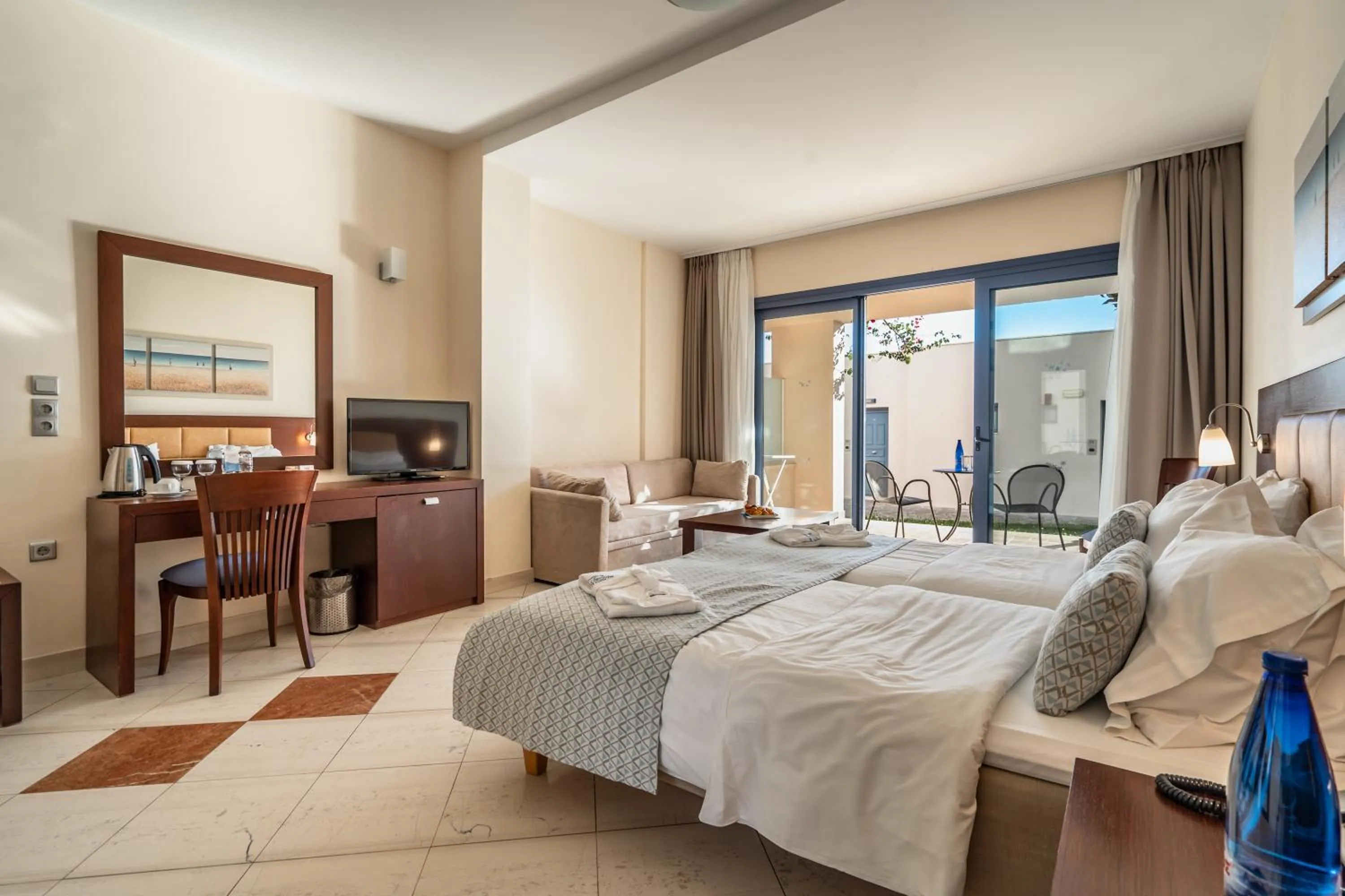 Bed in Porto Galini Seaside Resort & Spa