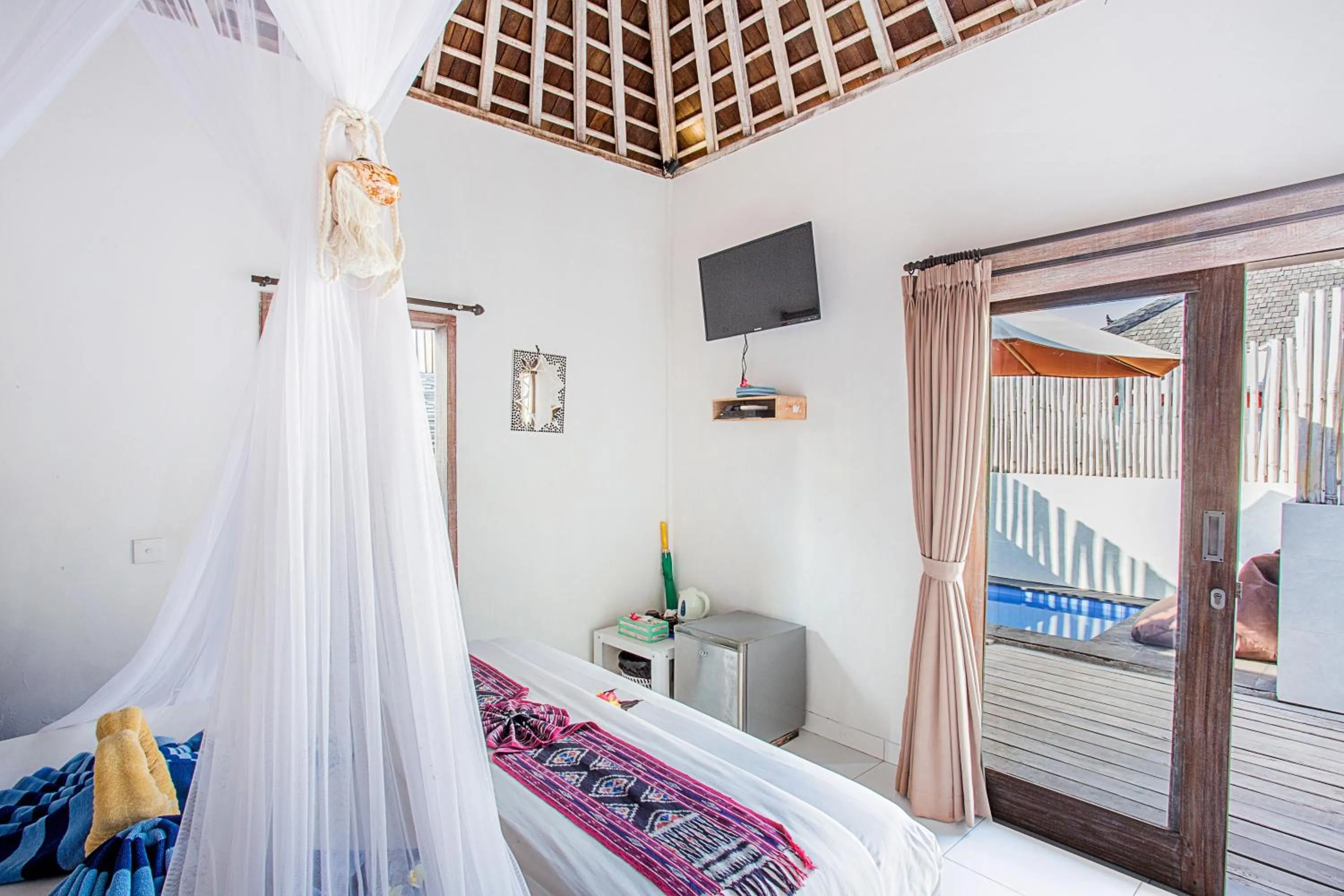 Bed in Svaha Private Villas Ceningan