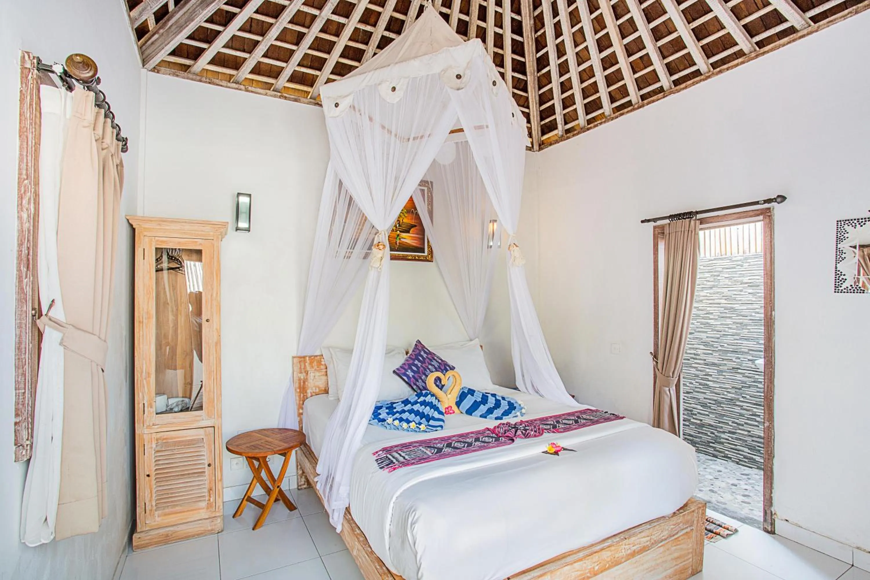 Bed in Svaha Private Villas Ceningan