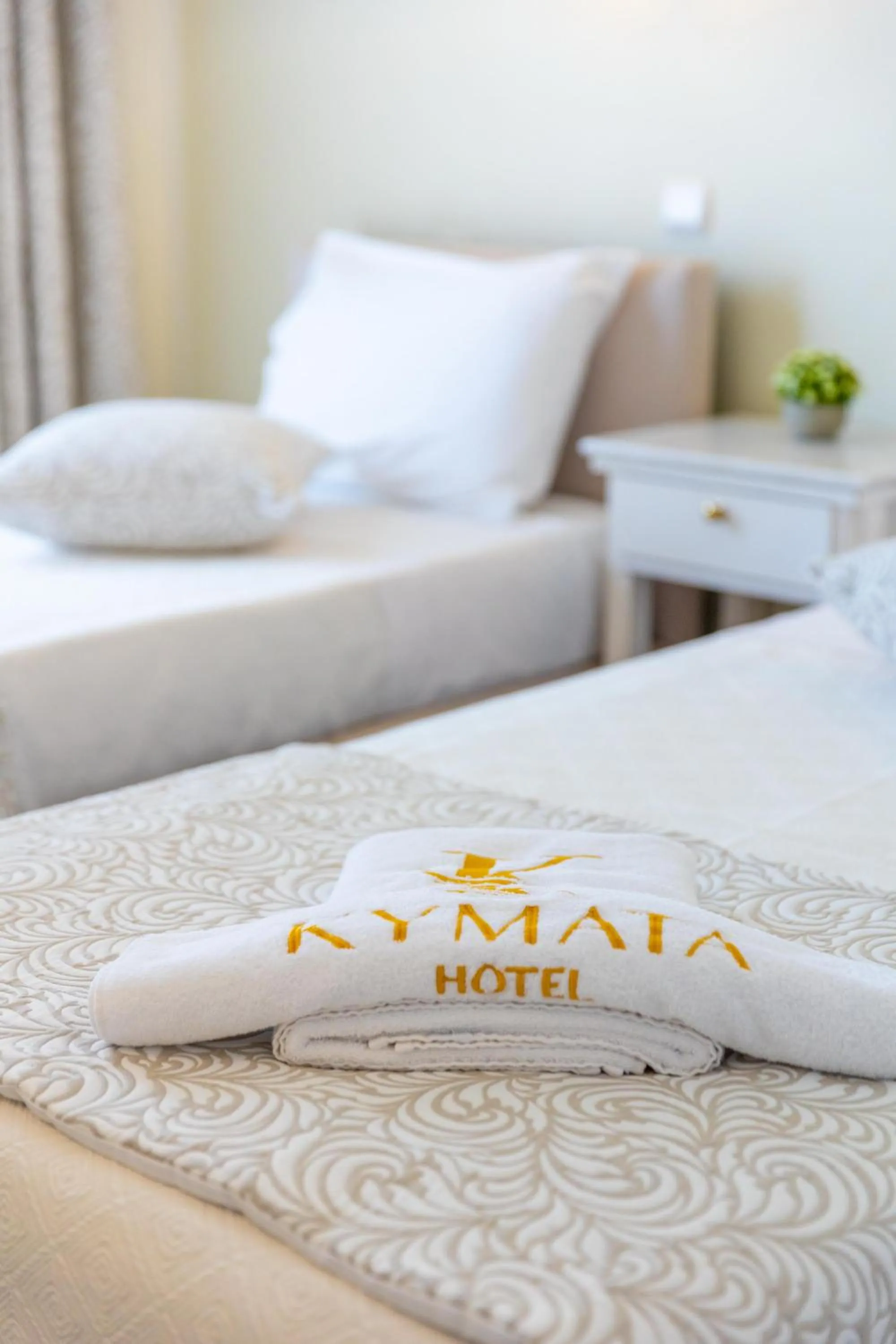 Bed in Kymata Hotel