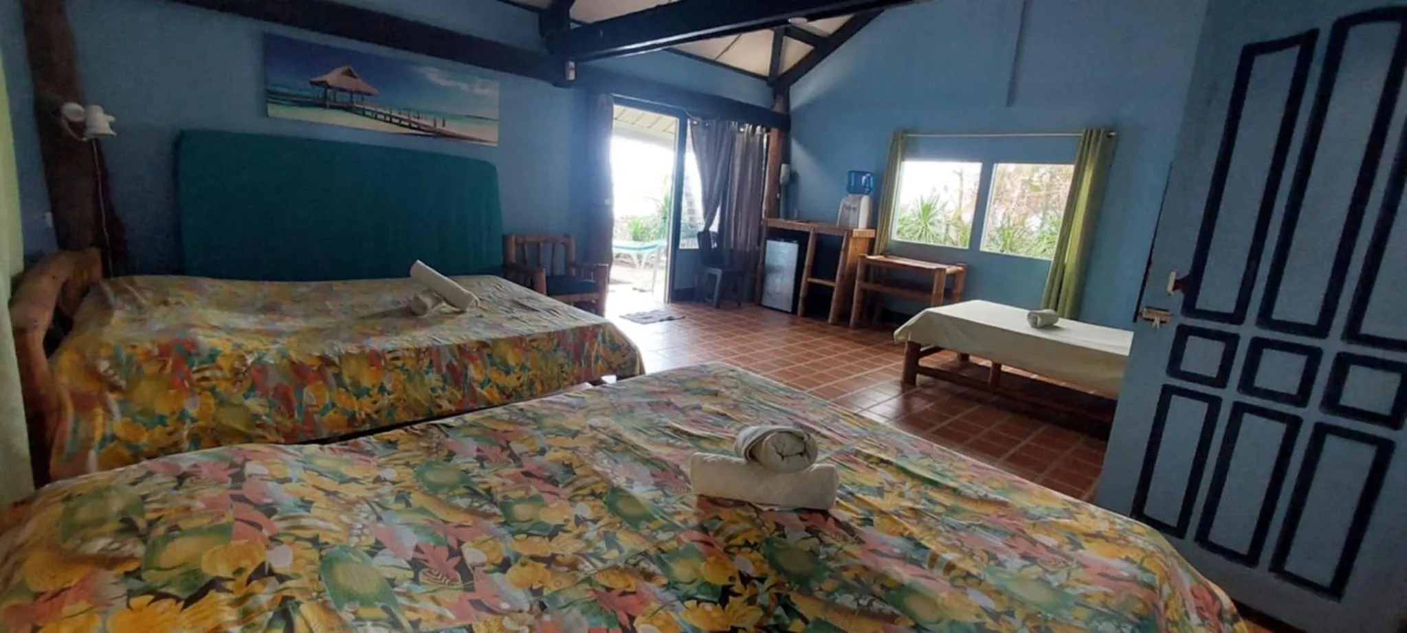 Bed in Ravenala Beach Bungalows