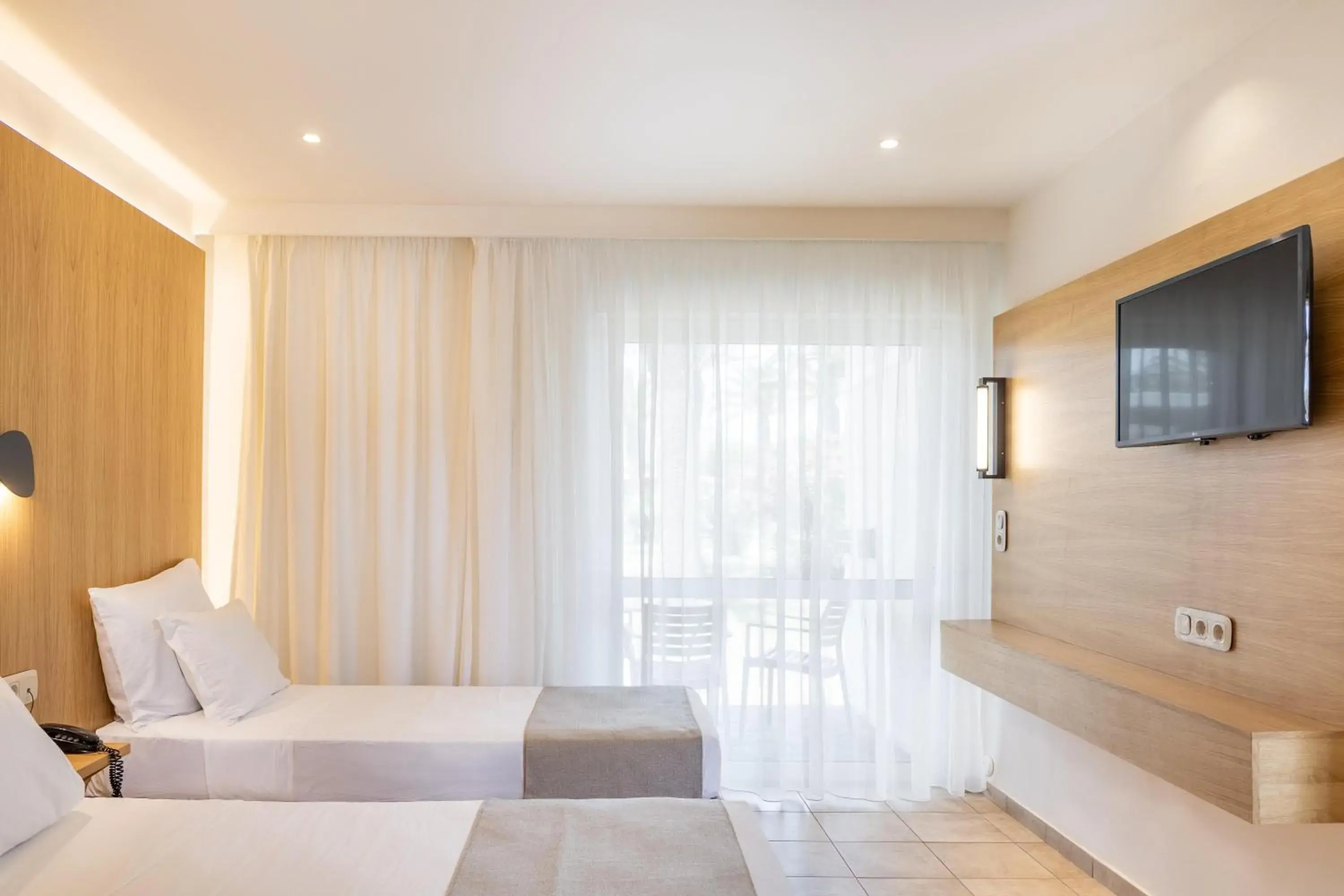 Photo of the whole room, Bed in Civitel Creta Beach Photo of the whole room, Bed in Civitel Creta Beach