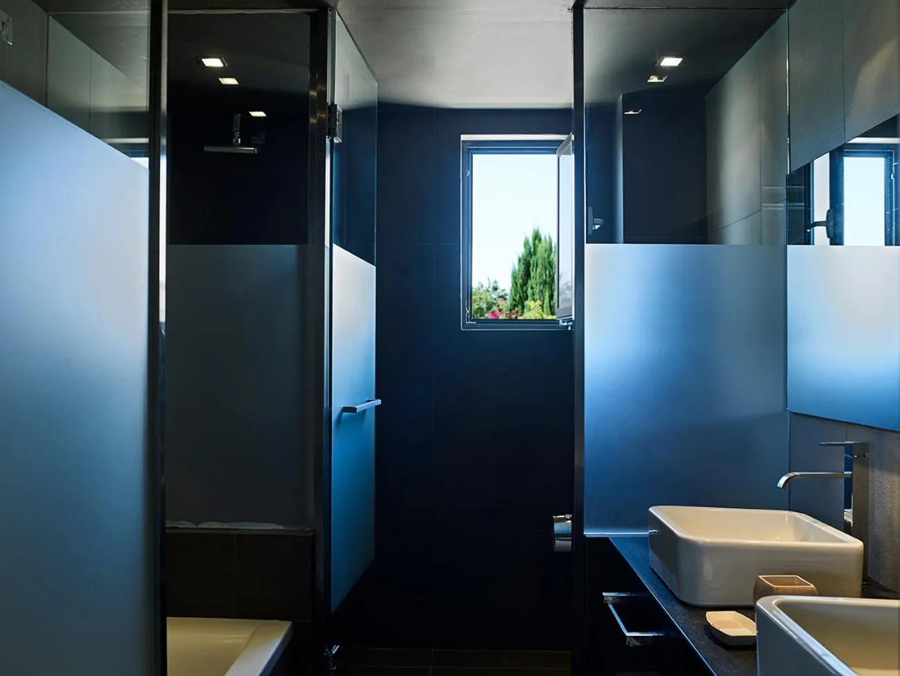 Bathroom in Pelagos Suites Hotel & Spa