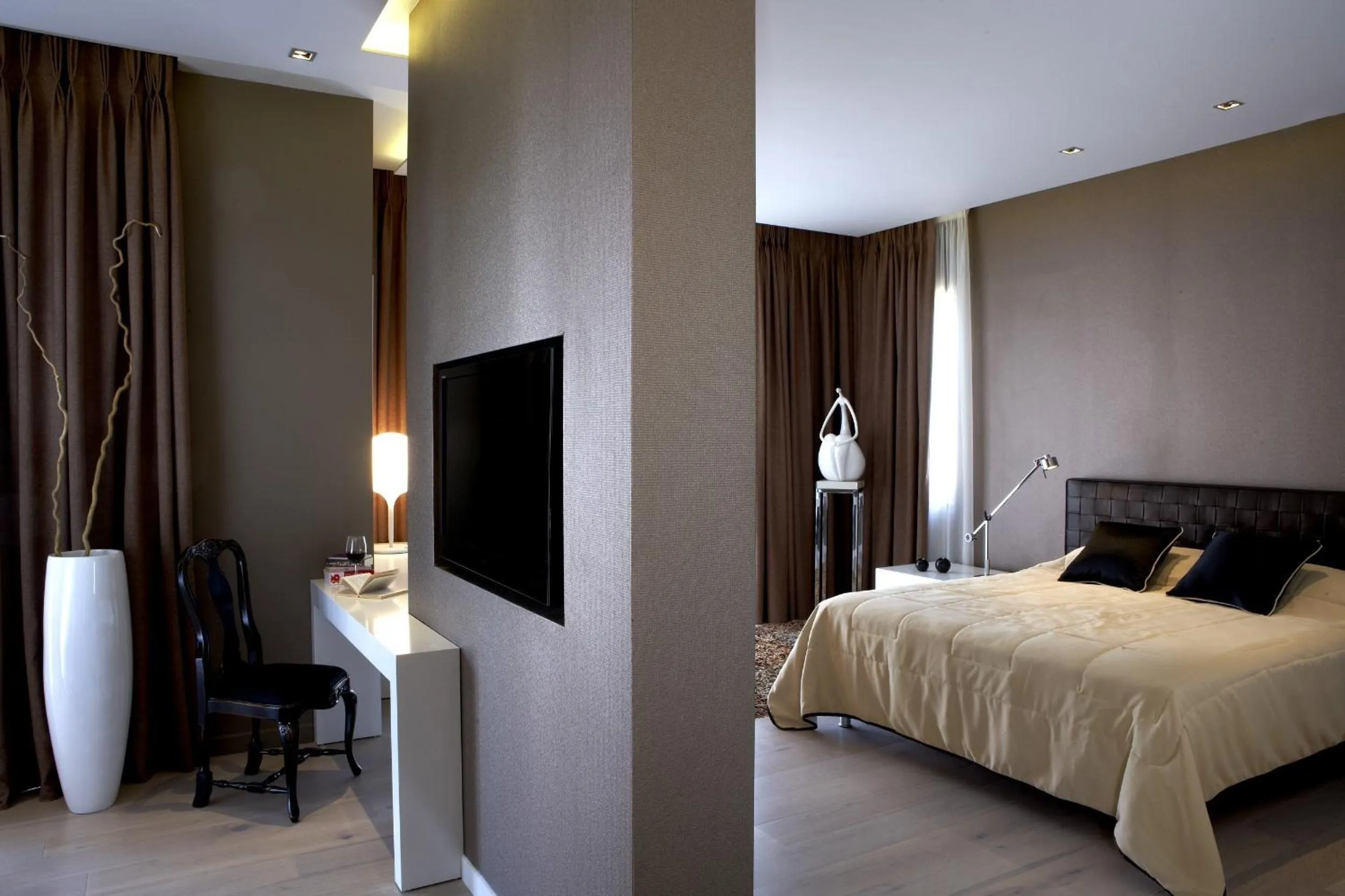 Photo of the whole room, Bed in Pelagos Suites Hotel & Spa