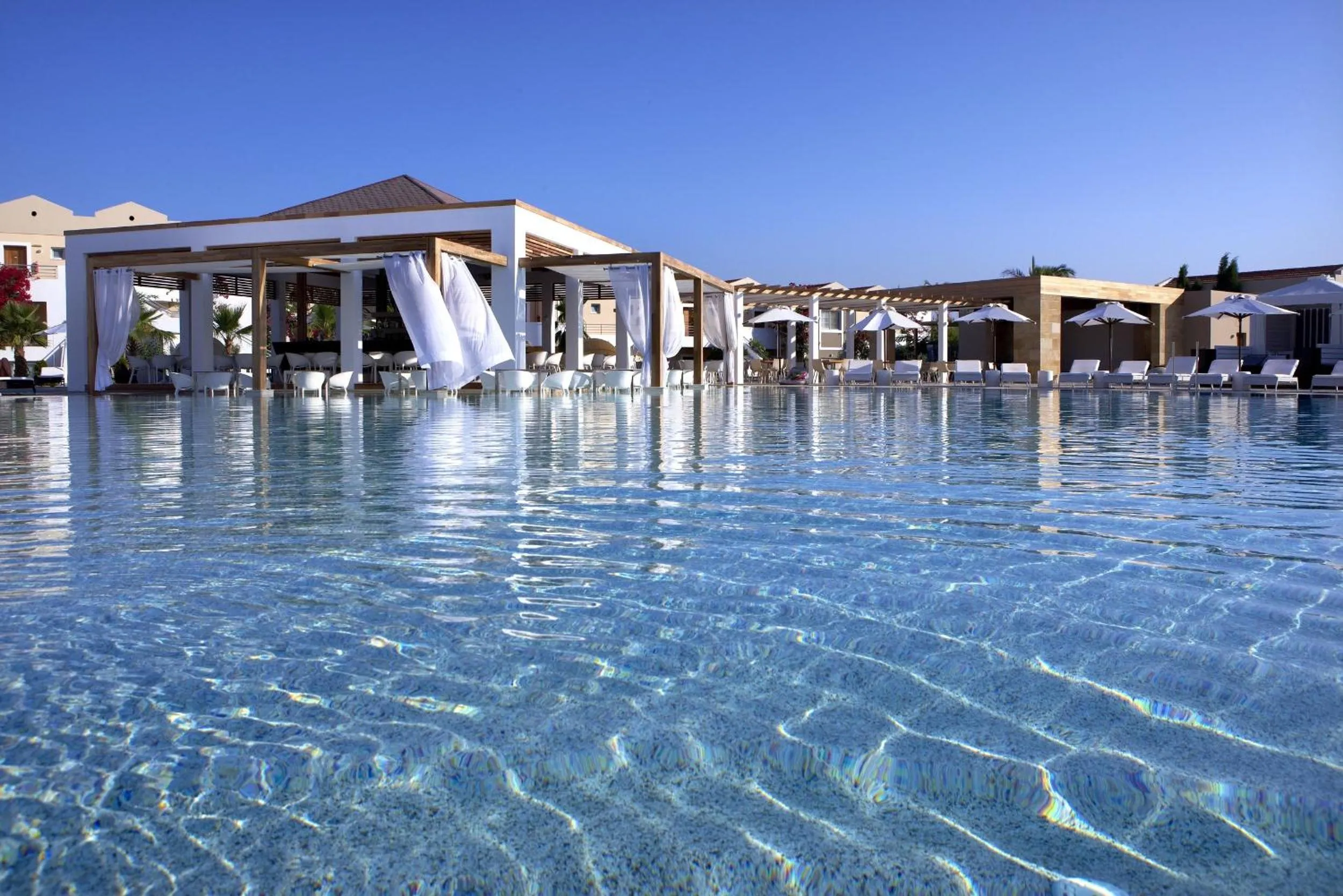 Swimming pool in Pelagos Suites Hotel & Spa