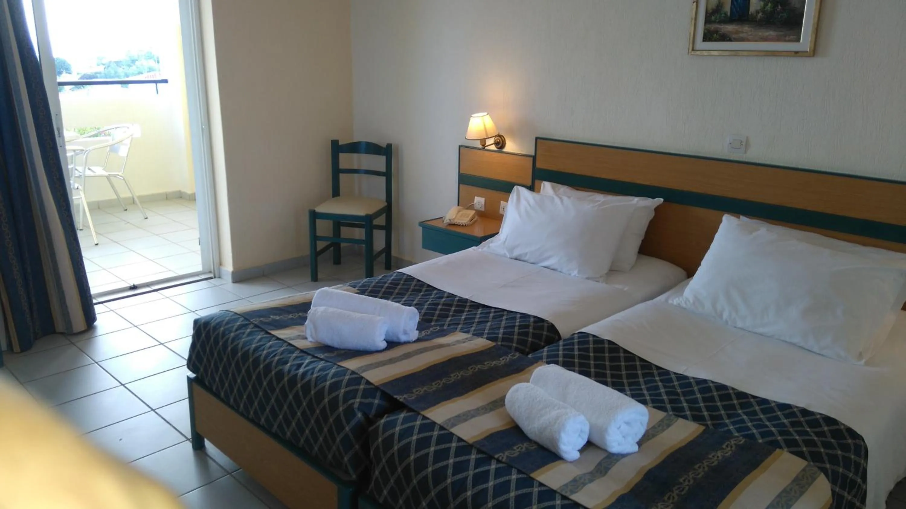 Bed in Porto Skala Village Hotel