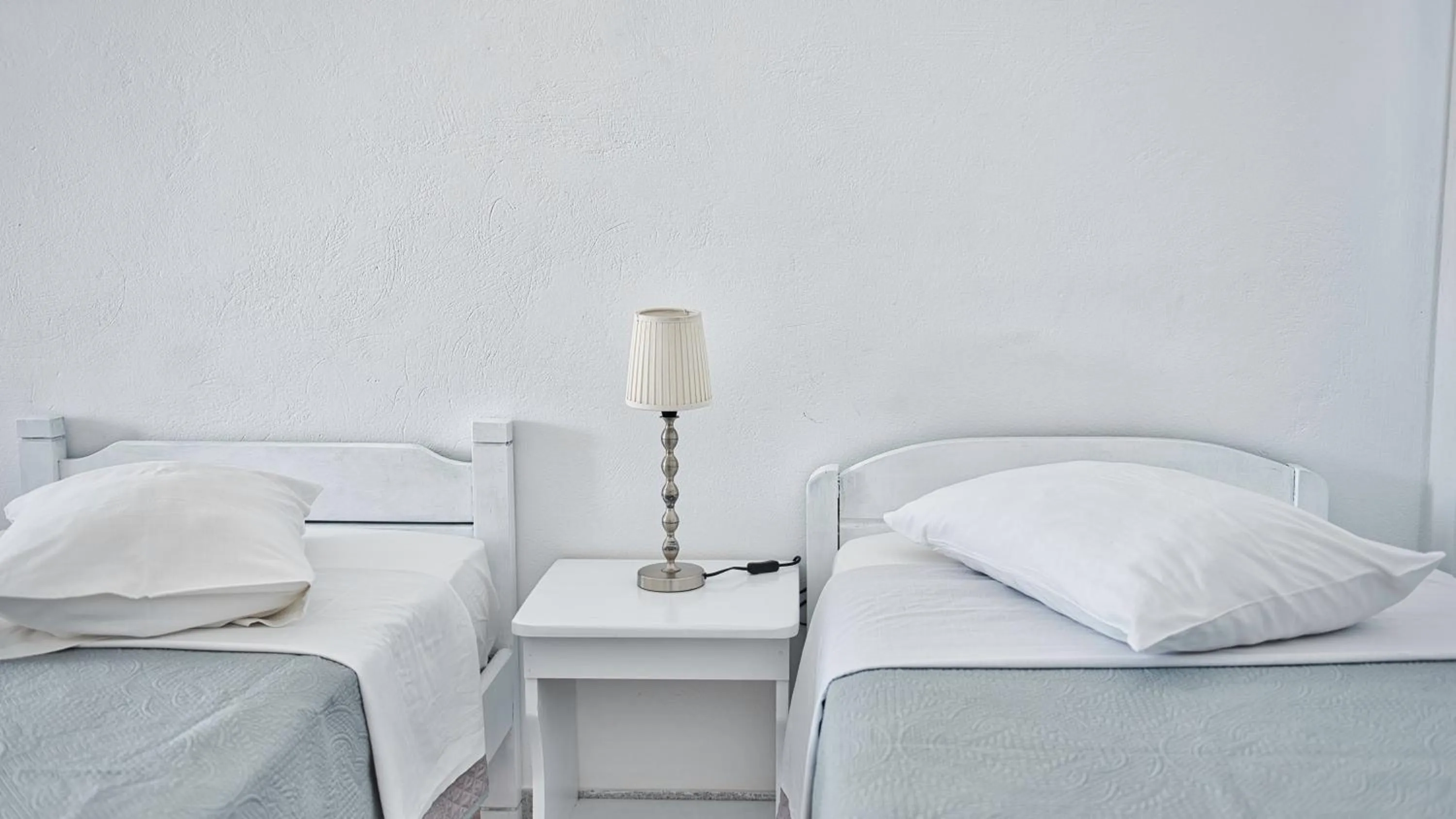 Bed in Caldera View Resort - Adults Only