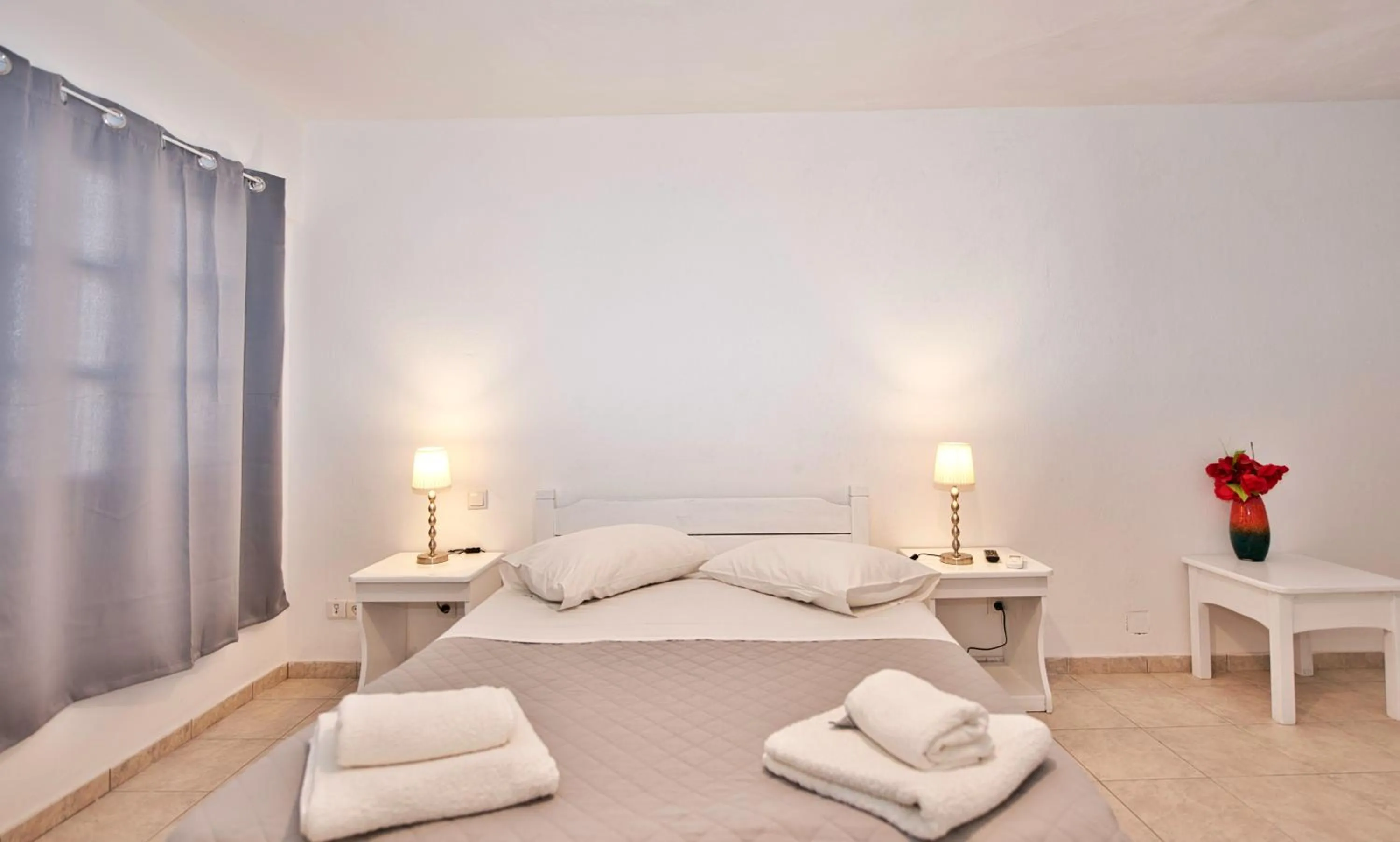 Bed in Caldera View Resort - Adults Only