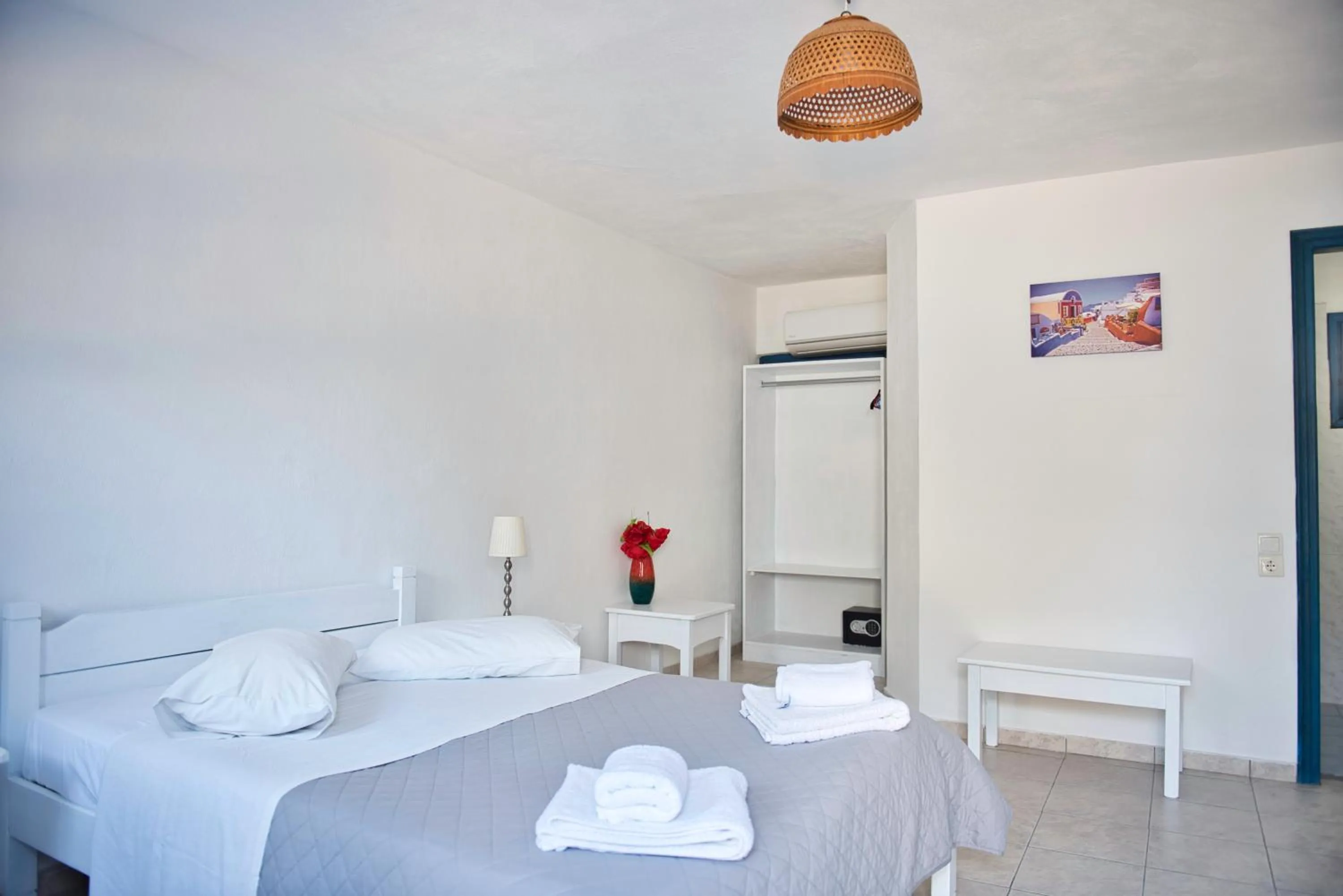 Bed in Caldera View Resort - Adults Only