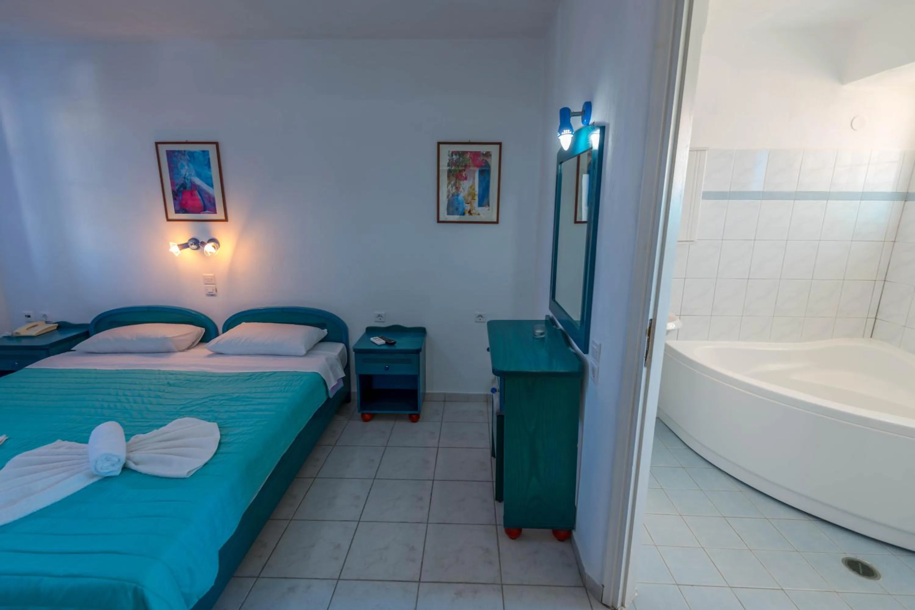 Photo of the whole room, Bed in Caldera View Resort - Adults Only