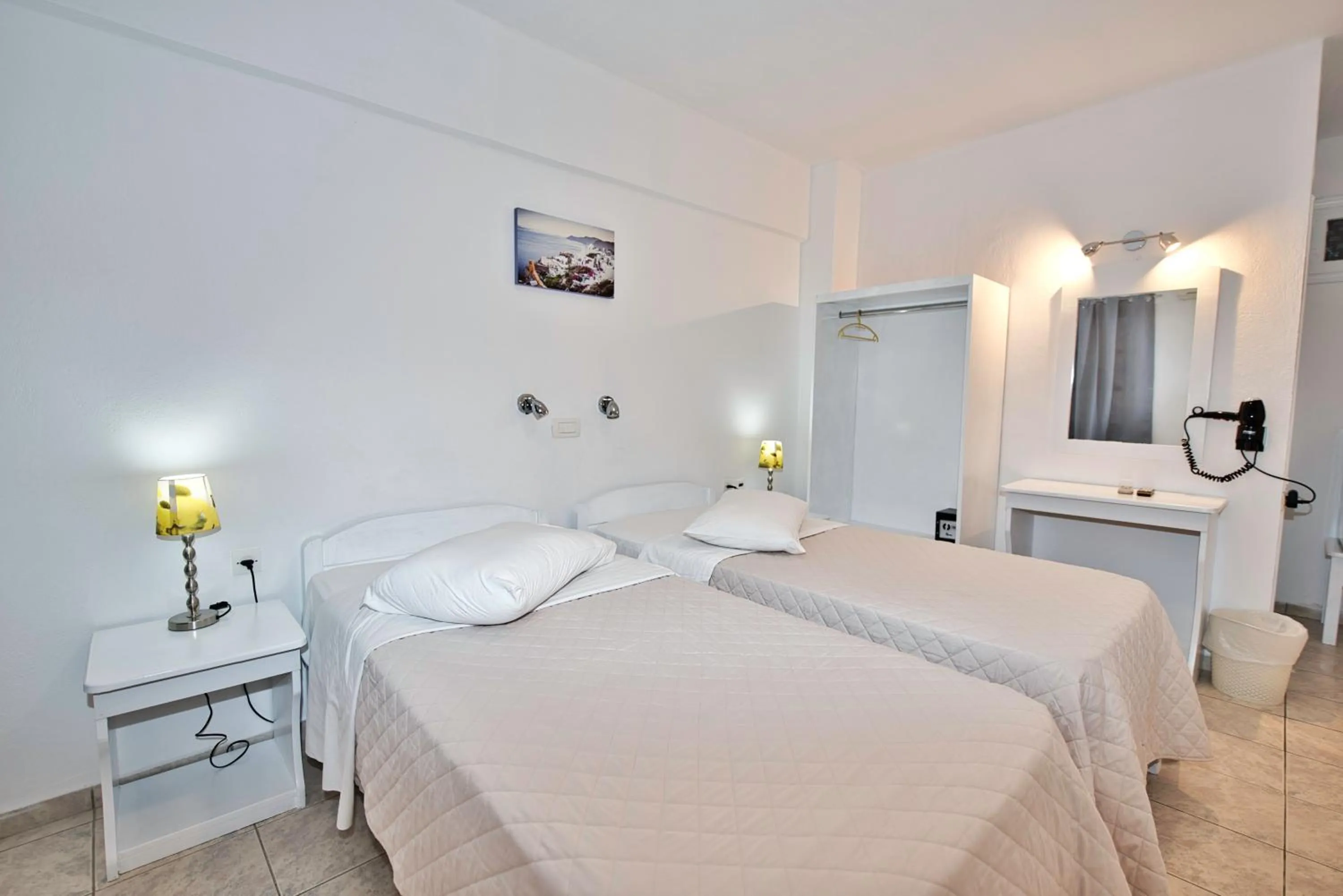 Bed in Caldera View Resort - Adults Only