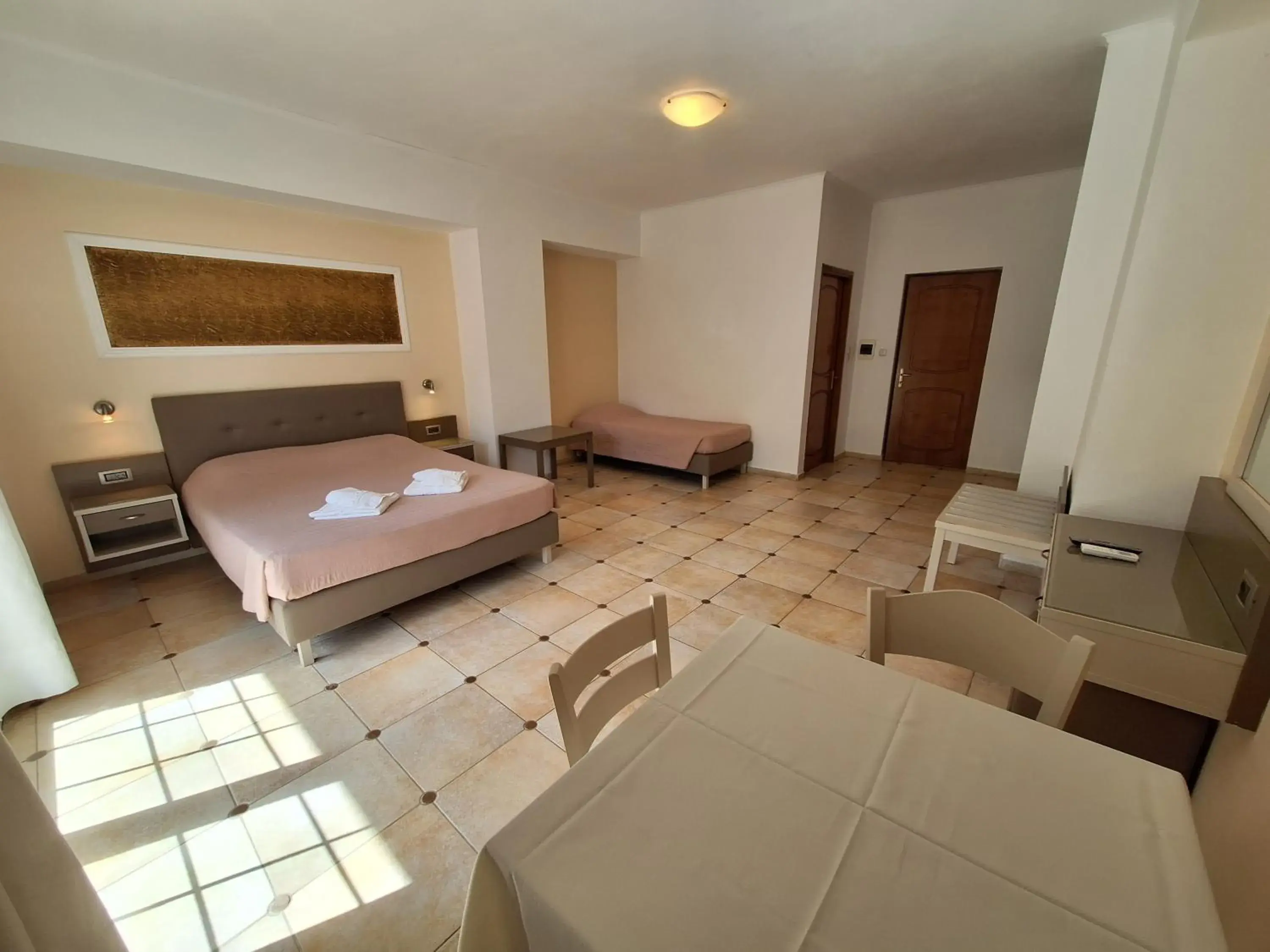 Photo of the whole room, Bed in Perla Beach Photo of the whole room, Bed in Perla Beach