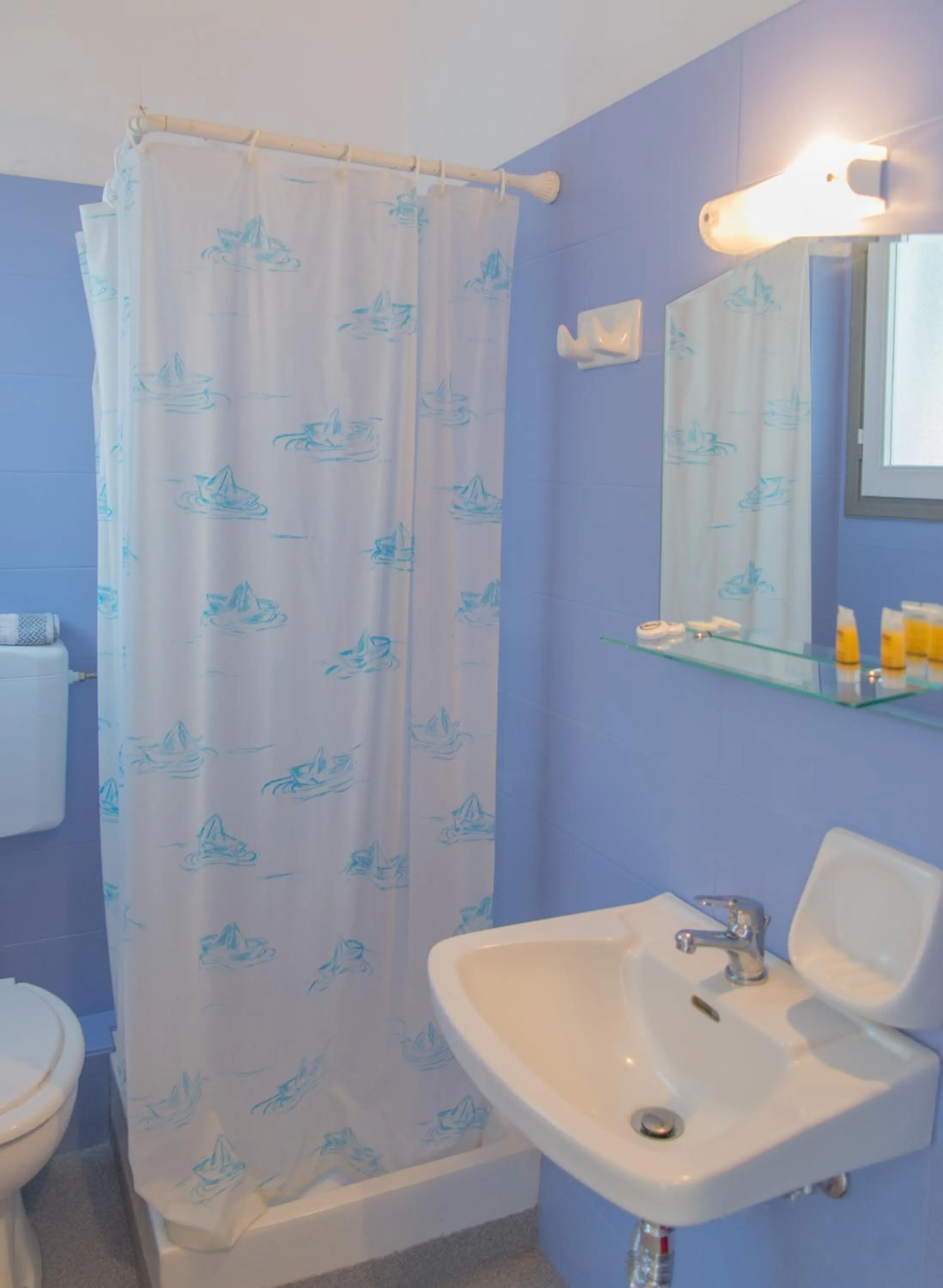 Toilet in Ostria Hotel & Apartments