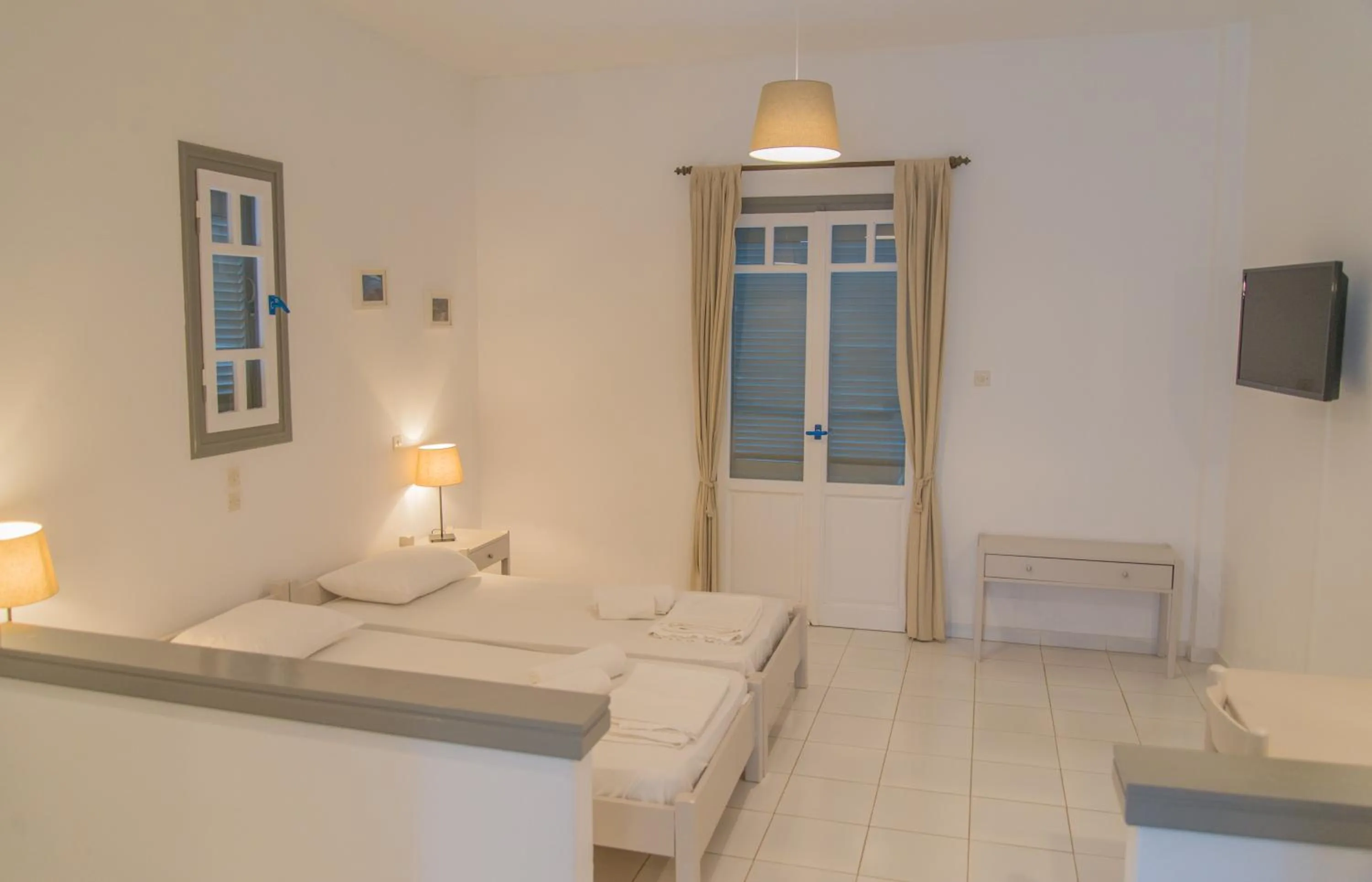 Bed in Ostria Hotel & Apartments