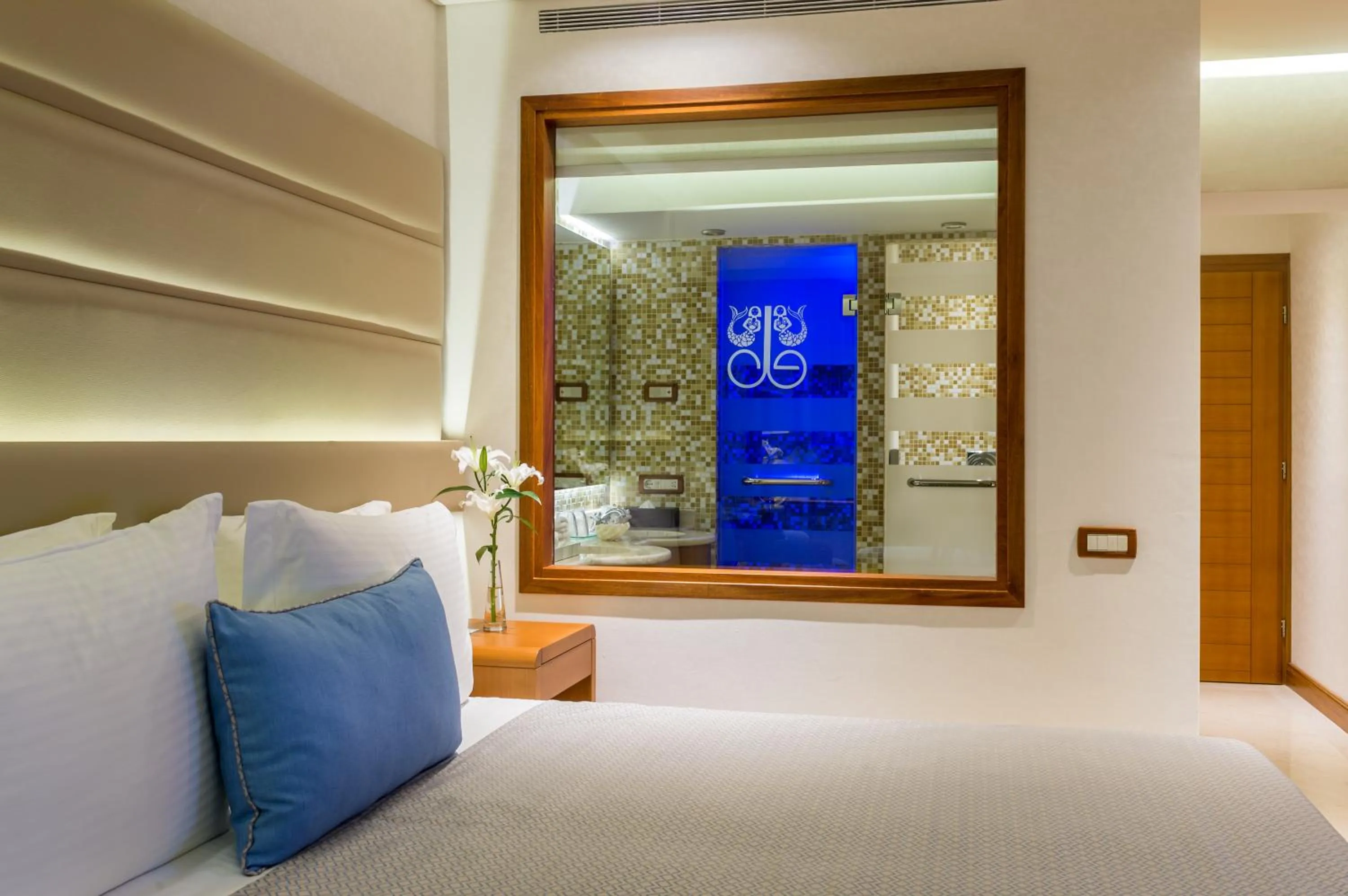Bathroom, Bed in Elounda Bay Palace, a Member of the Leading Hotels of the World