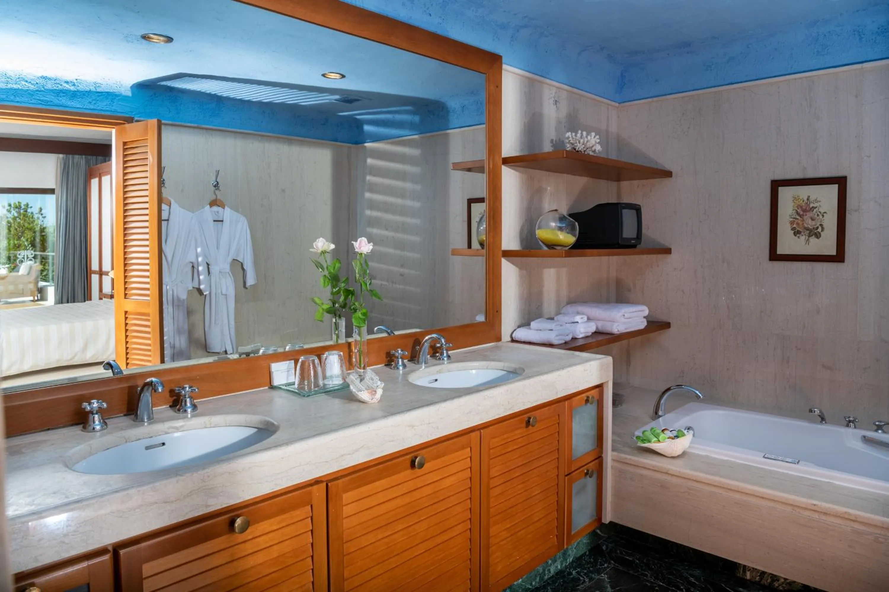 Bathroom, Bed in Elounda Bay Palace, a Member of the Leading Hotels of the World