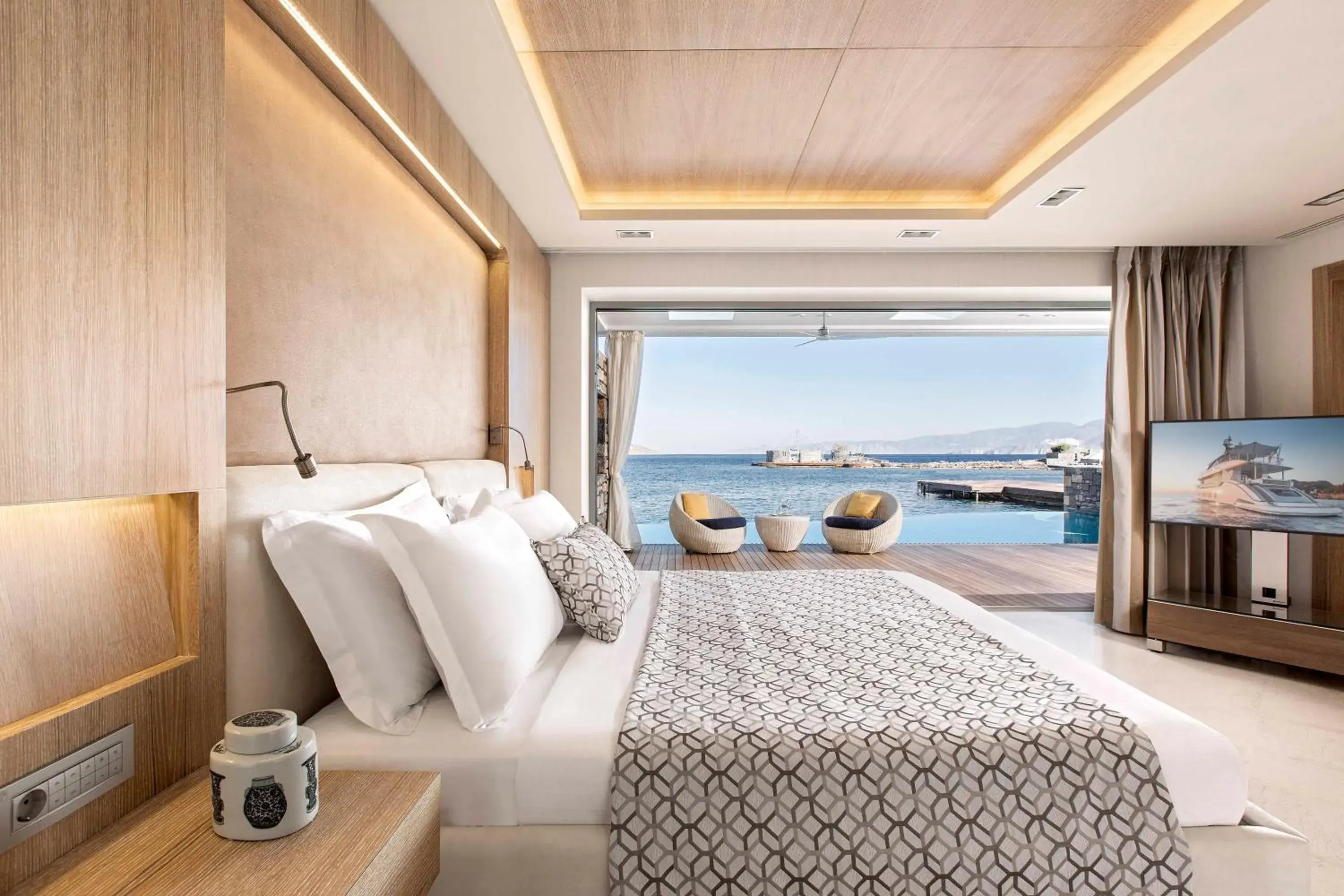 Bedroom, Bed in Elounda Beach Hotel & Villas, a Member of the Leading Hotels of the World Bedroom, Bed in Elounda Beach Hotel & Villas, a Member of the Leading Hotels of the World
