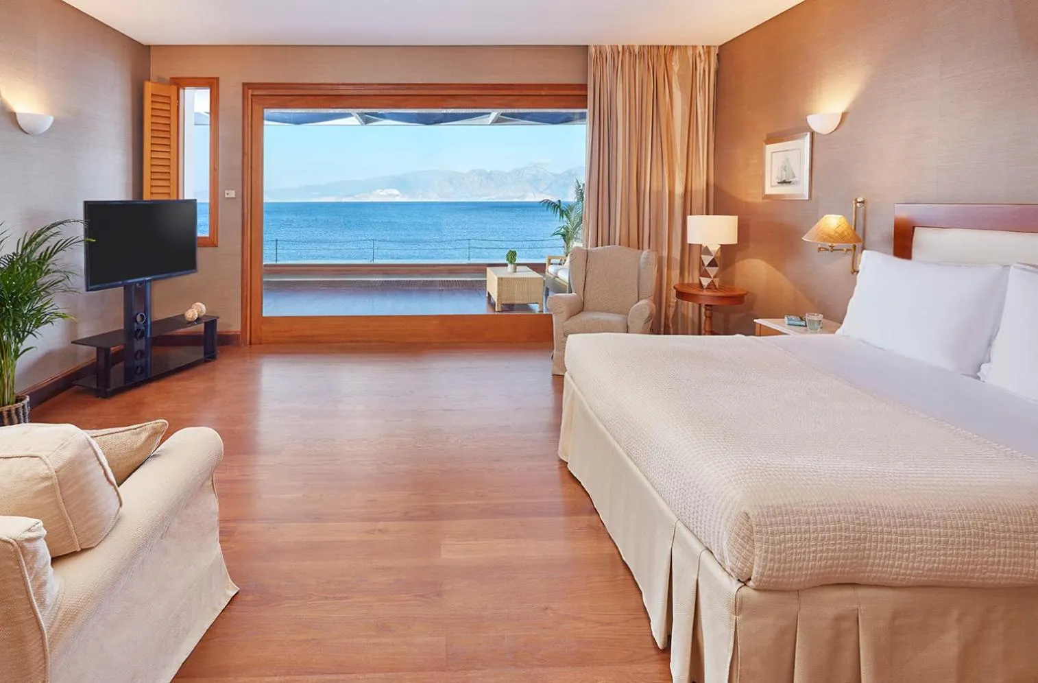 Bedroom, Bed in Elounda Beach Hotel & Villas, a Member of the Leading Hotels of the World