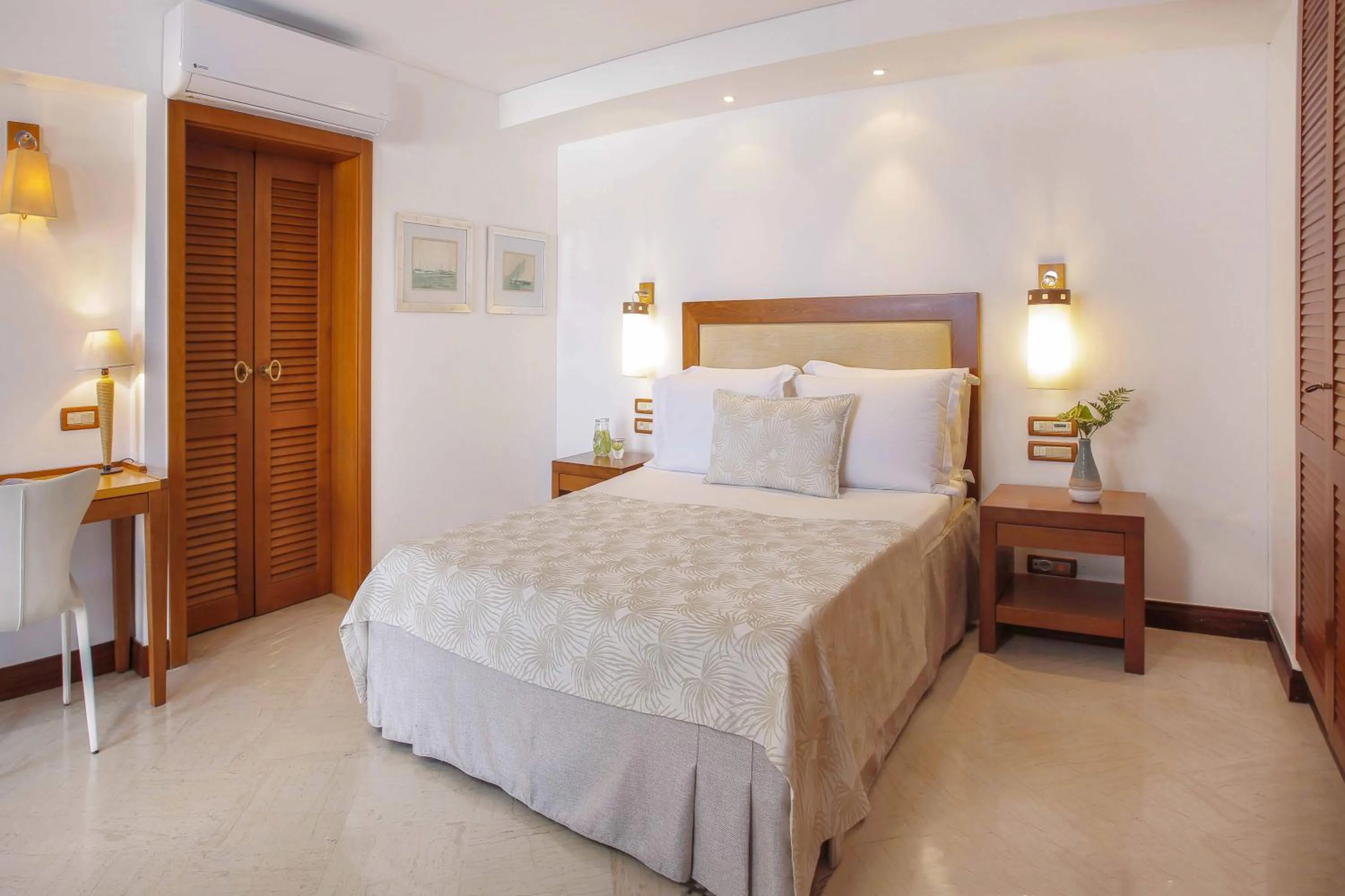 Bedroom, Bed in Elounda Beach Hotel & Villas, a Member of the Leading Hotels of the World