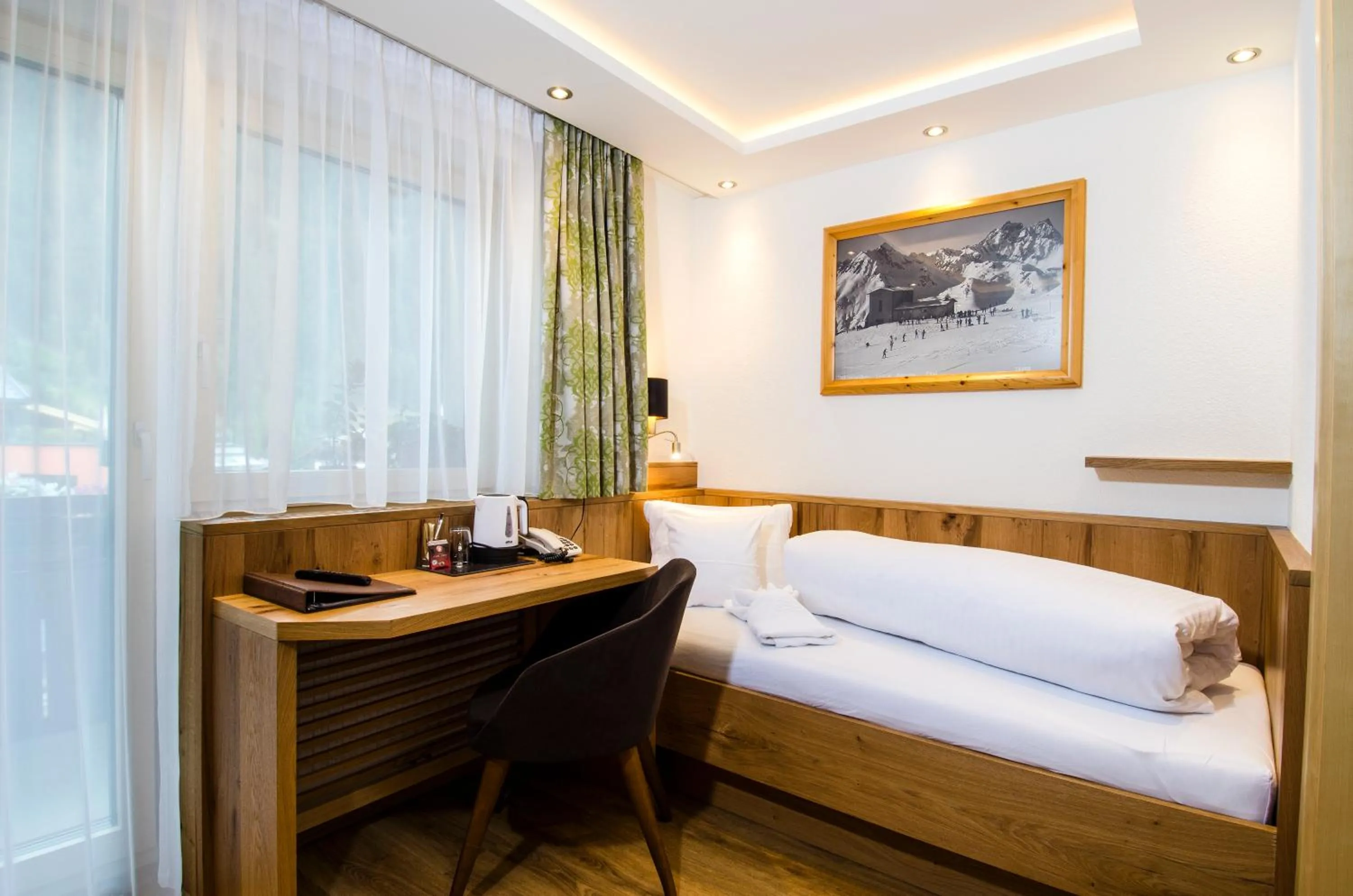 Bed in Hotel Garni Siegele - inklusive Silvretta-Card PREMIUM