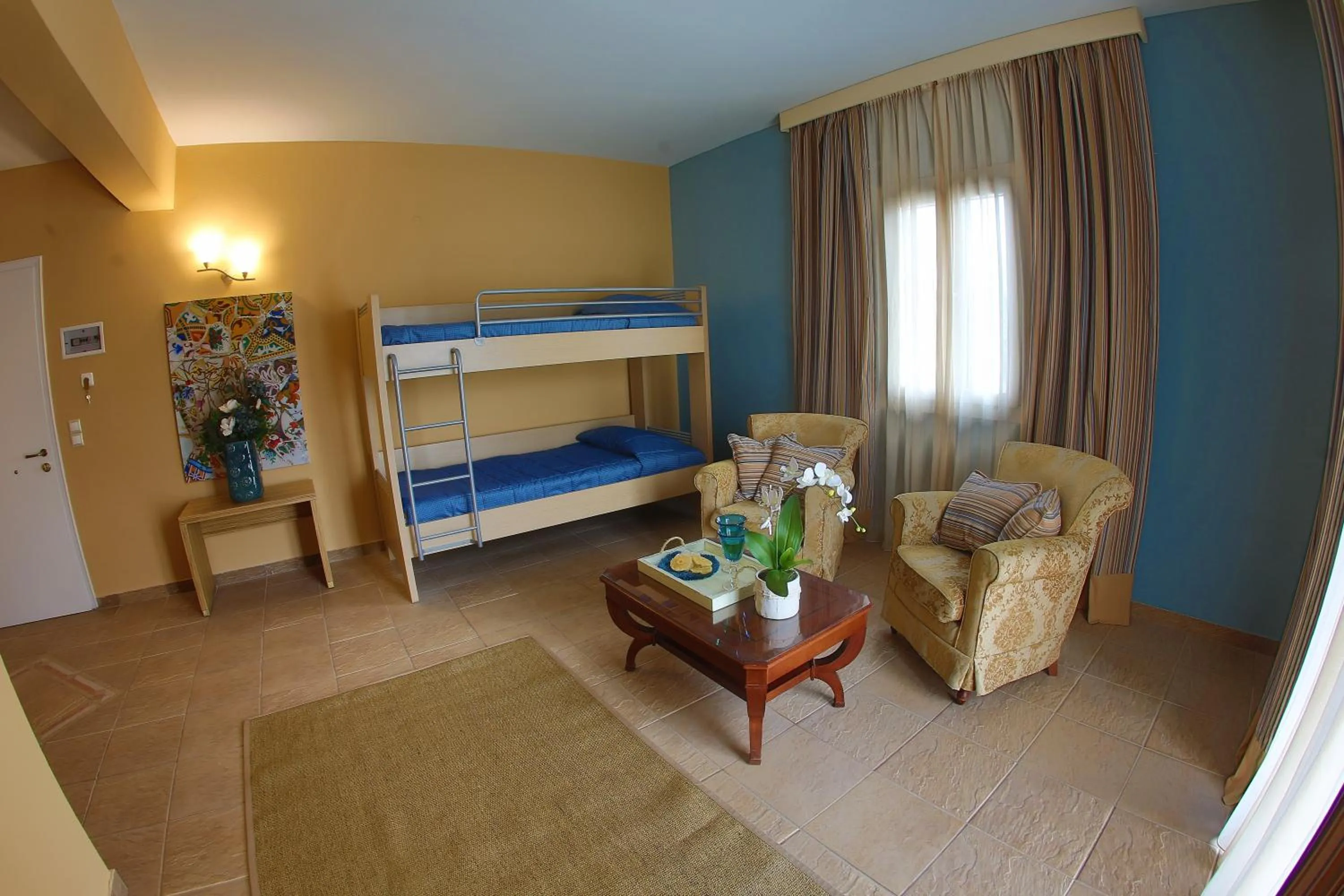 Photo of the whole room, Bed in Dolphin Bay Seaside Resort & Suites