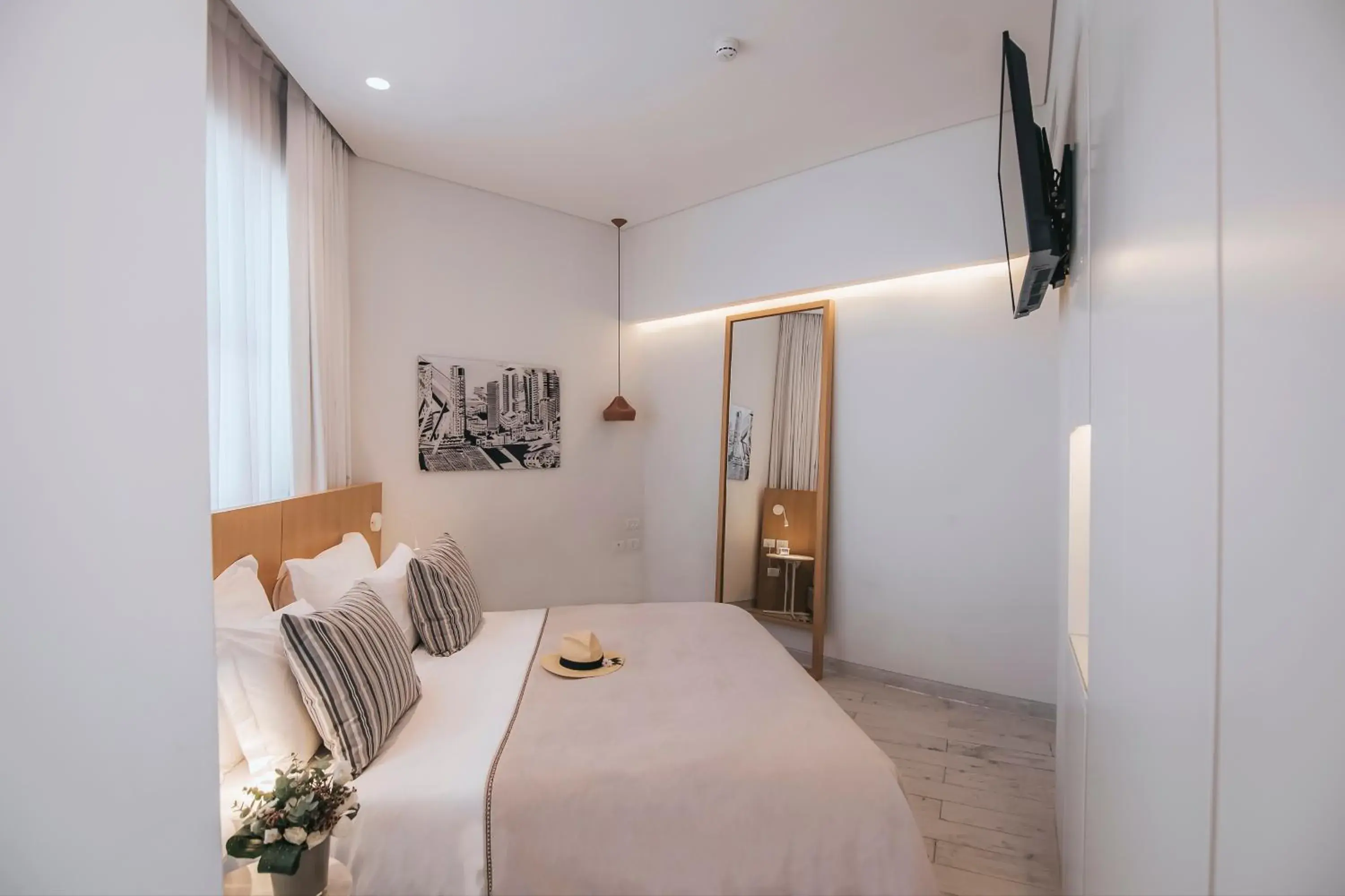 Living room, Bed in 65 Hotel, Rothschild Tel Aviv - an Atlas Boutique Hotel Living room, Bed in 65 Hotel, Rothschild Tel Aviv - an Atlas Boutique Hotel