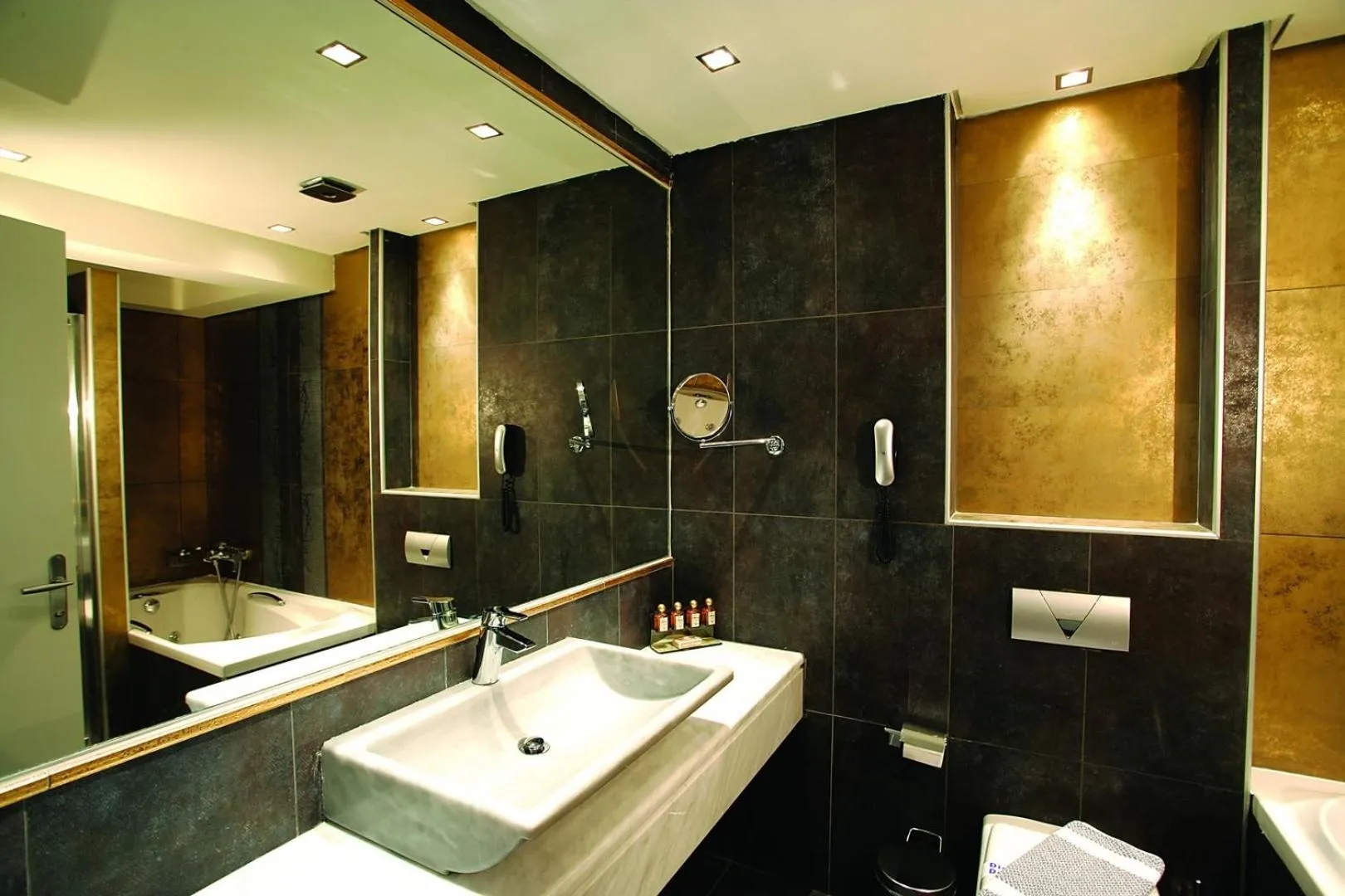 Bathroom in Elinotel Apolamare Hotel