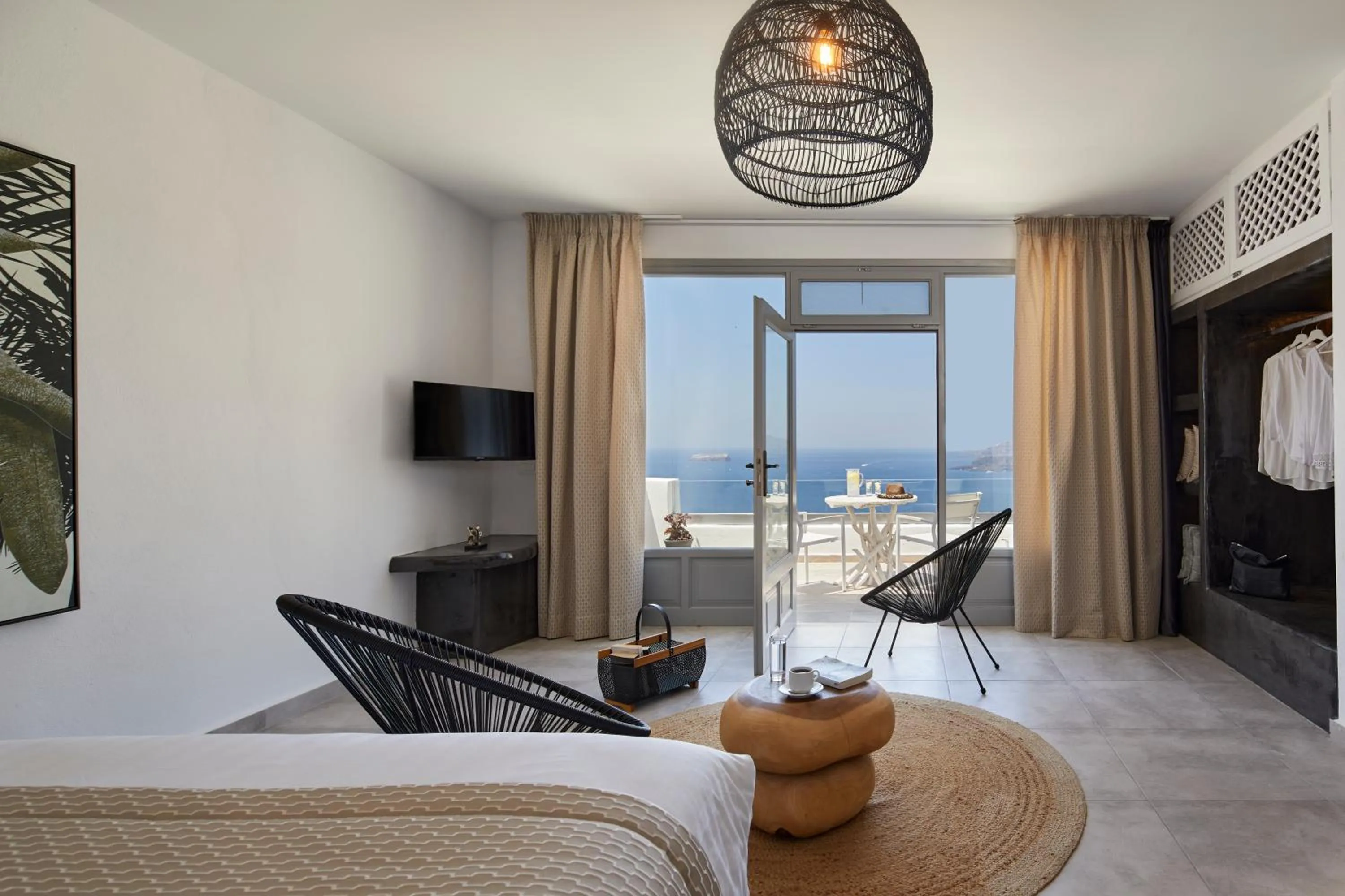 Seating area, Bed in Thermes Luxury Villas And Spa