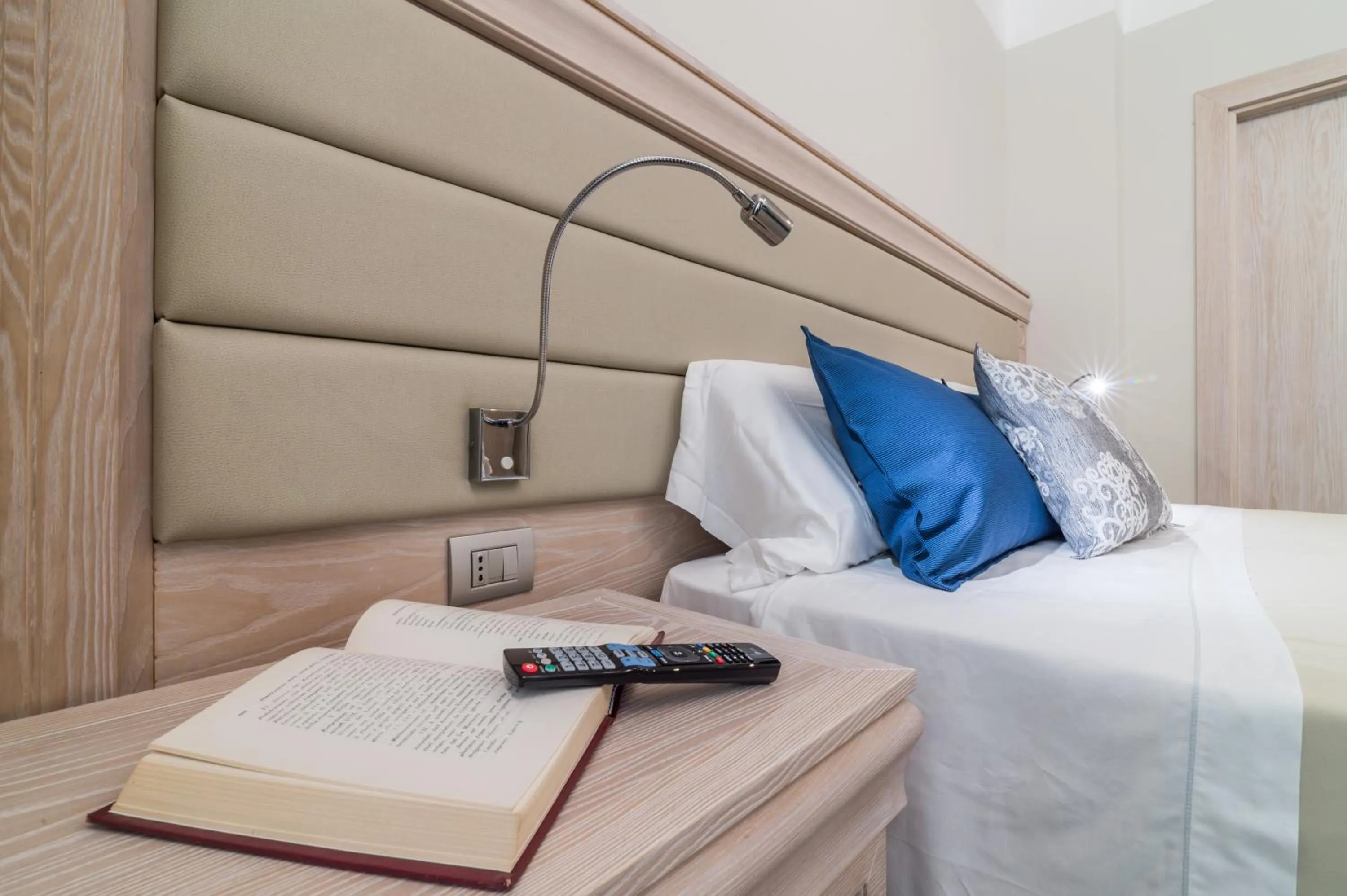 Decorative detail, Bed in L'Ambasciata Hotel de Charme