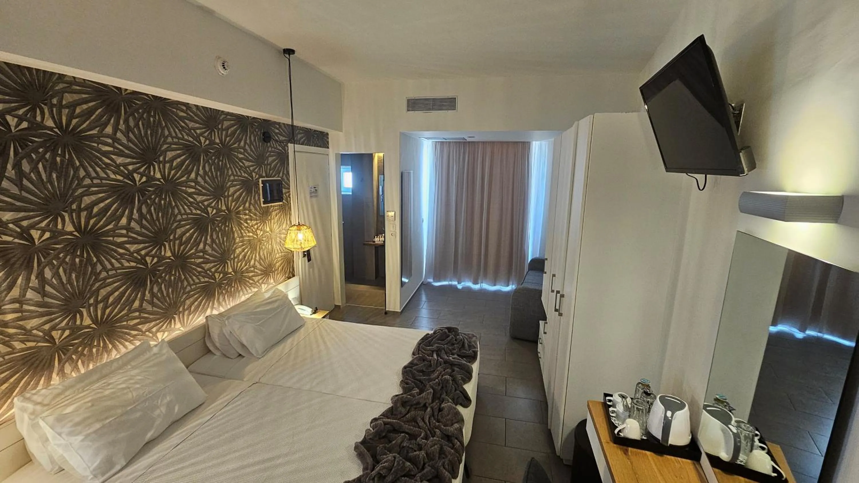 Bedroom in Atlantis Boutique City Hotel