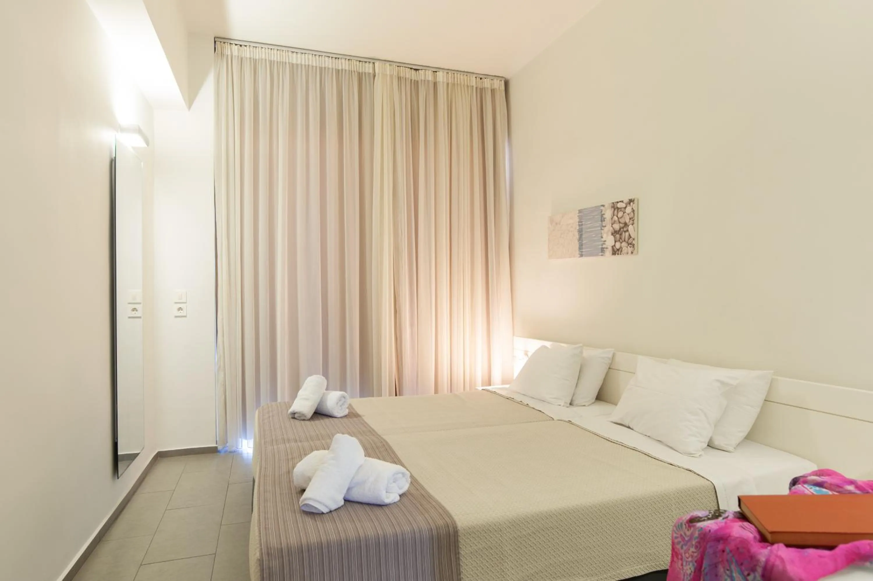 Bed in Atlantis Boutique City Hotel