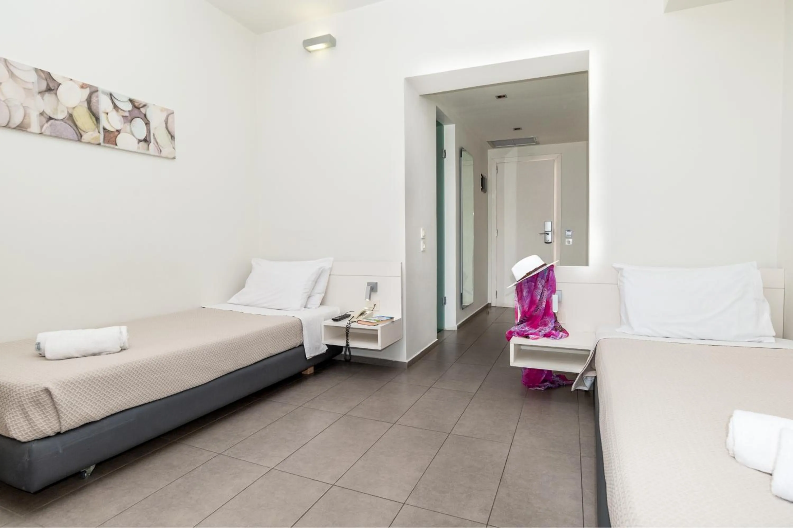 Bedroom in Atlantis Boutique City Hotel