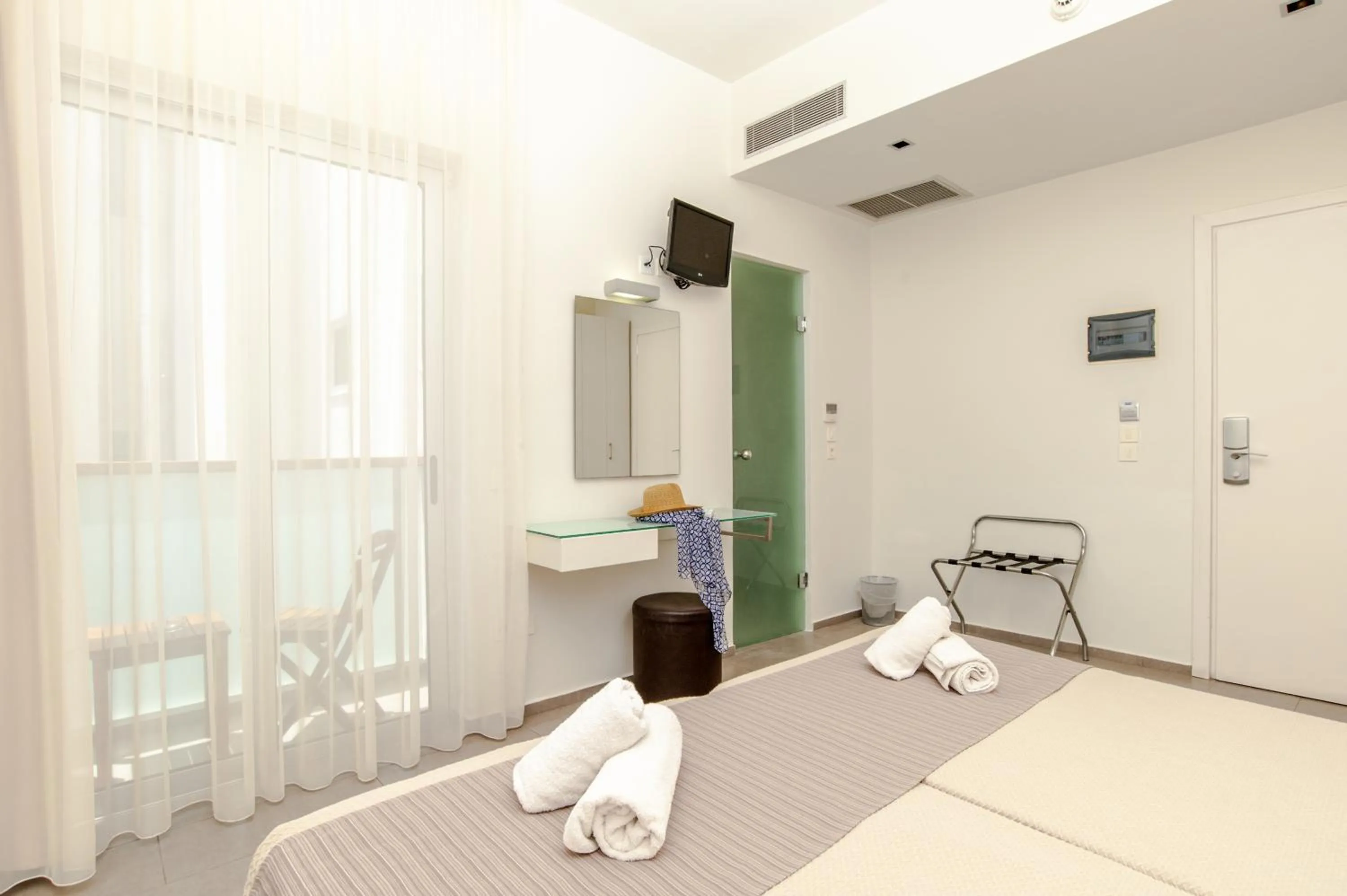 Bed in Atlantis Boutique City Hotel