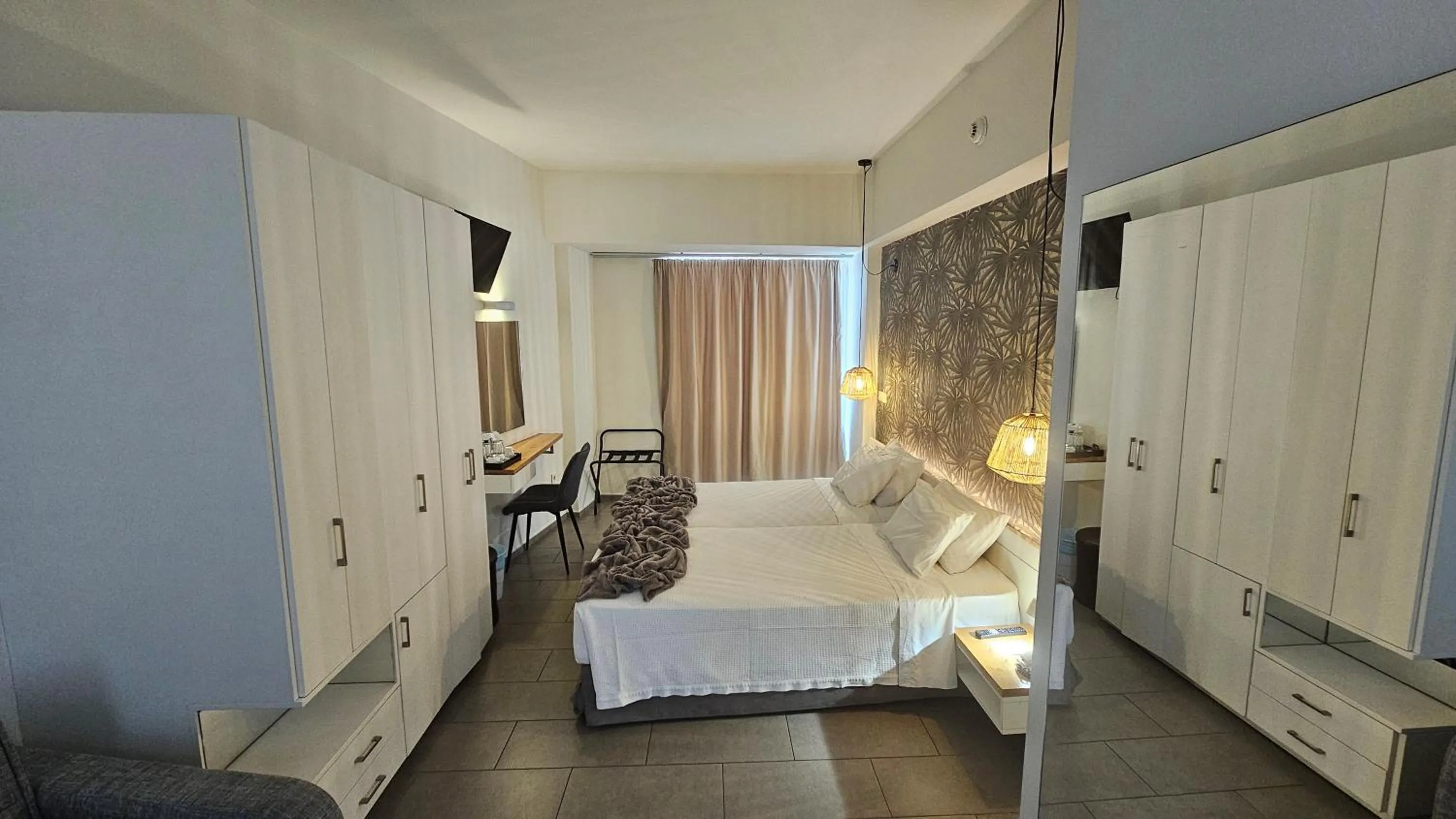 Bedroom in Atlantis Boutique City Hotel