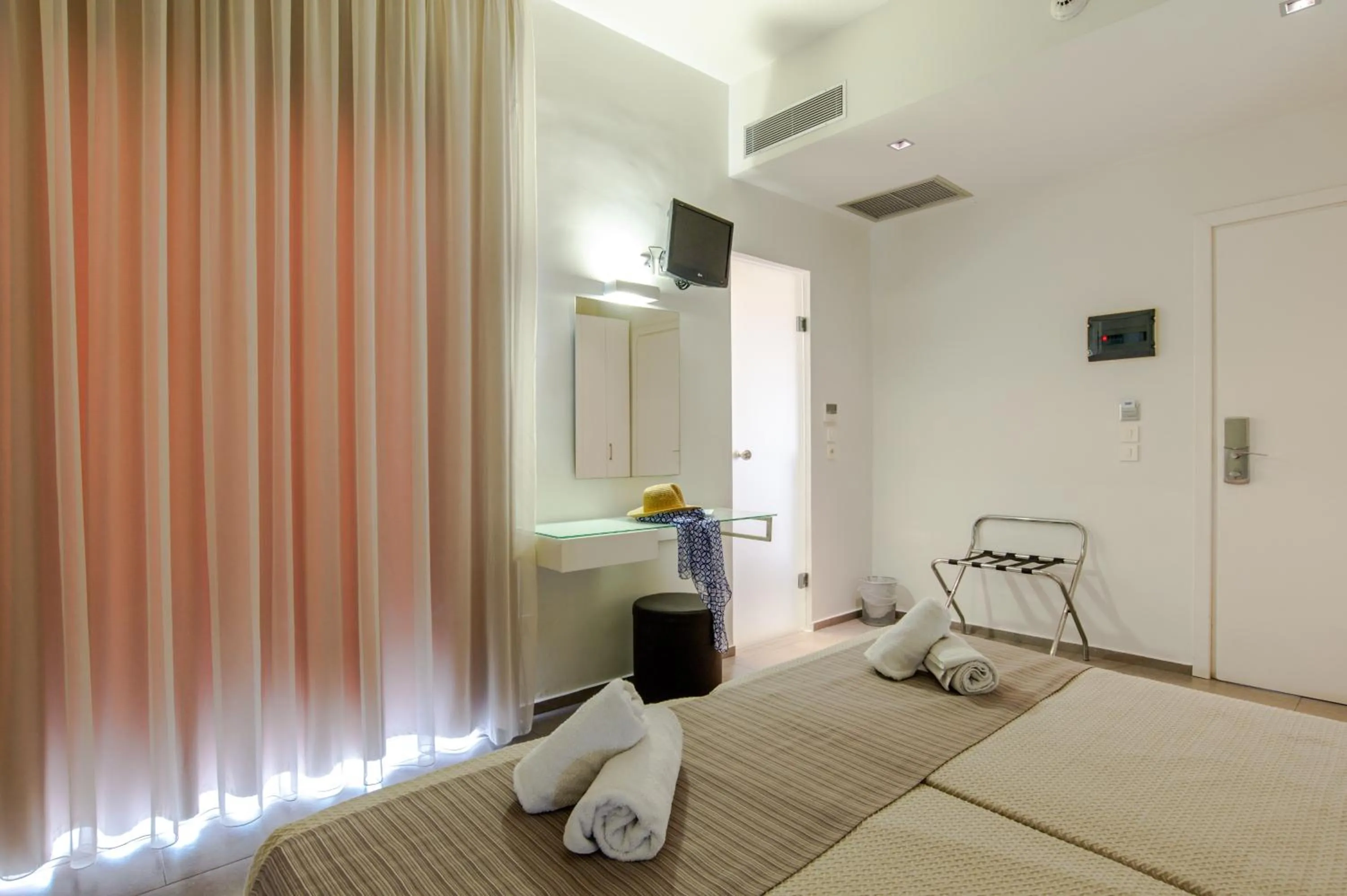 Bed in Atlantis Boutique City Hotel