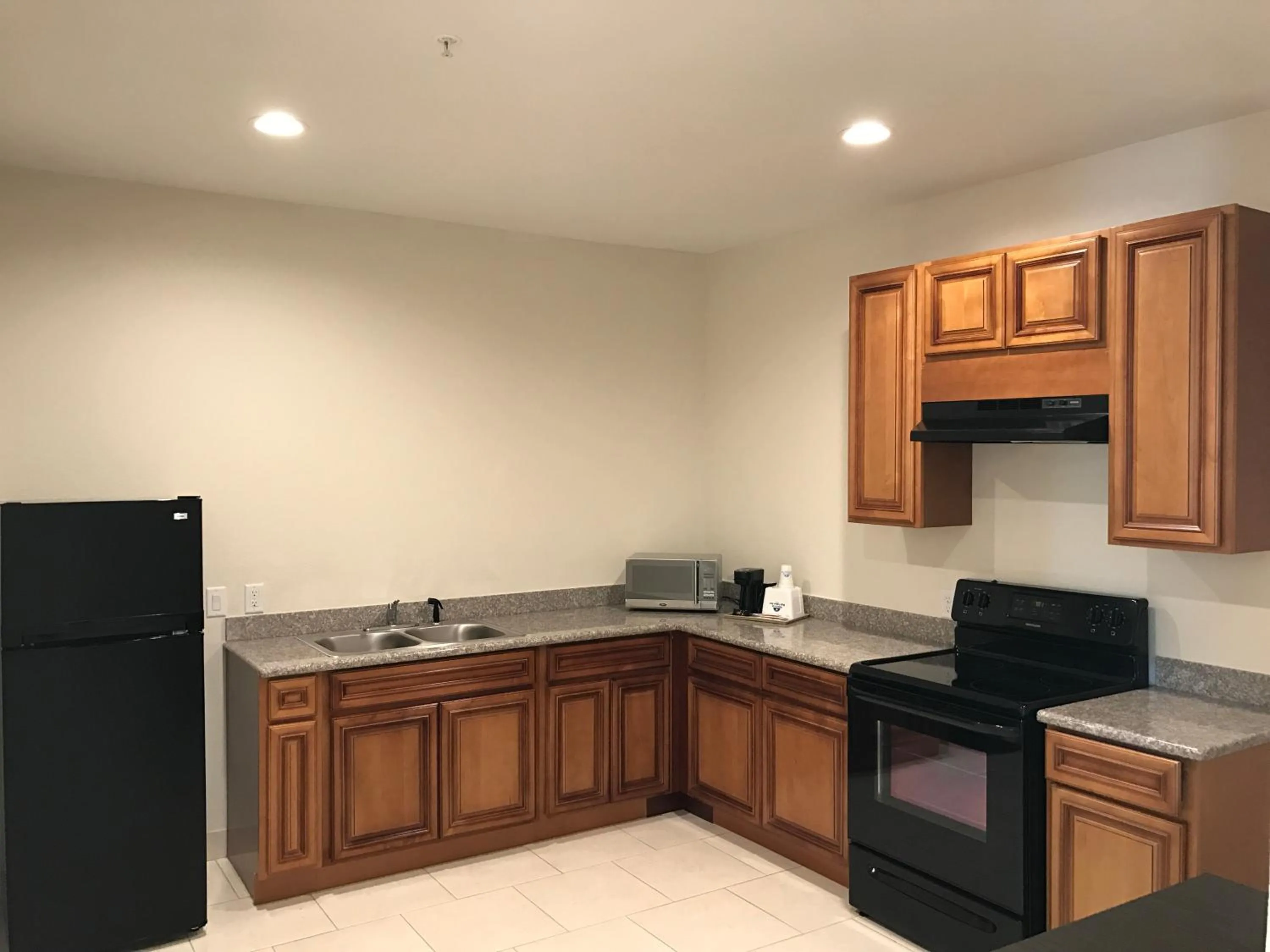 Kitchen or kitchenette in Regency Inn & Suites- NW Houston