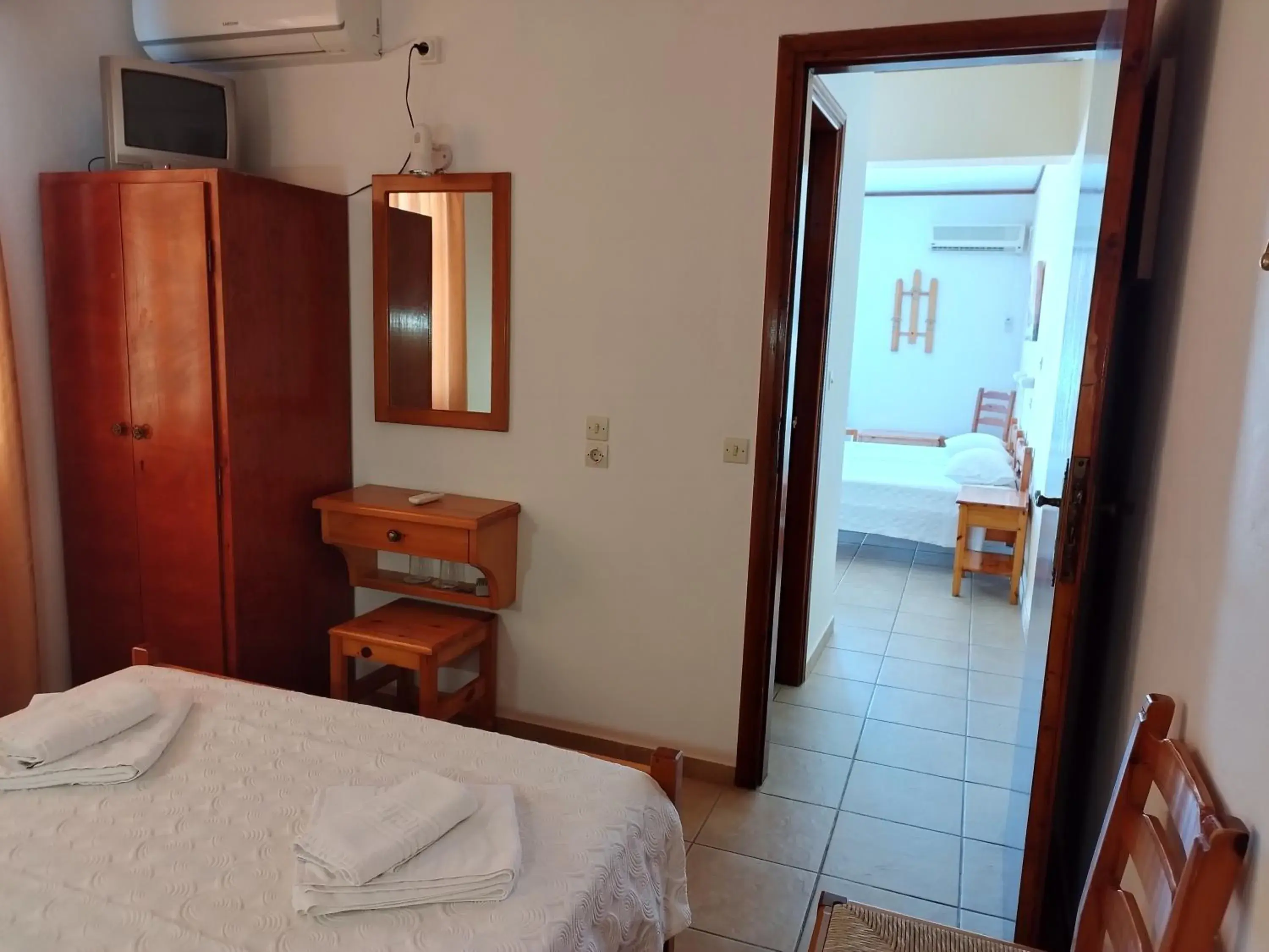 Classic Quadruple Room in Poseidon Hotel Classic Quadruple Room in Poseidon Hotel