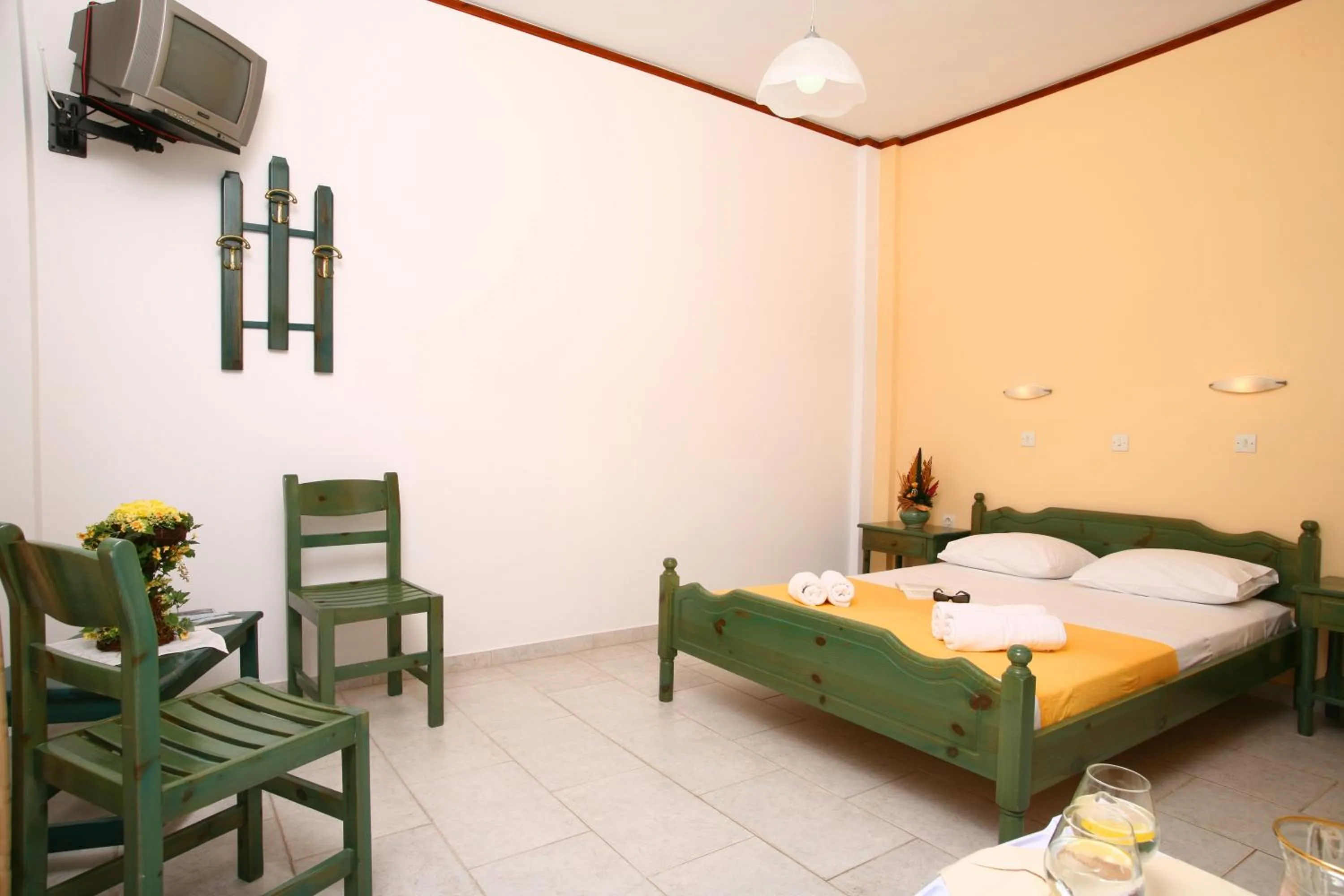 Bed in Poseidon Hotel