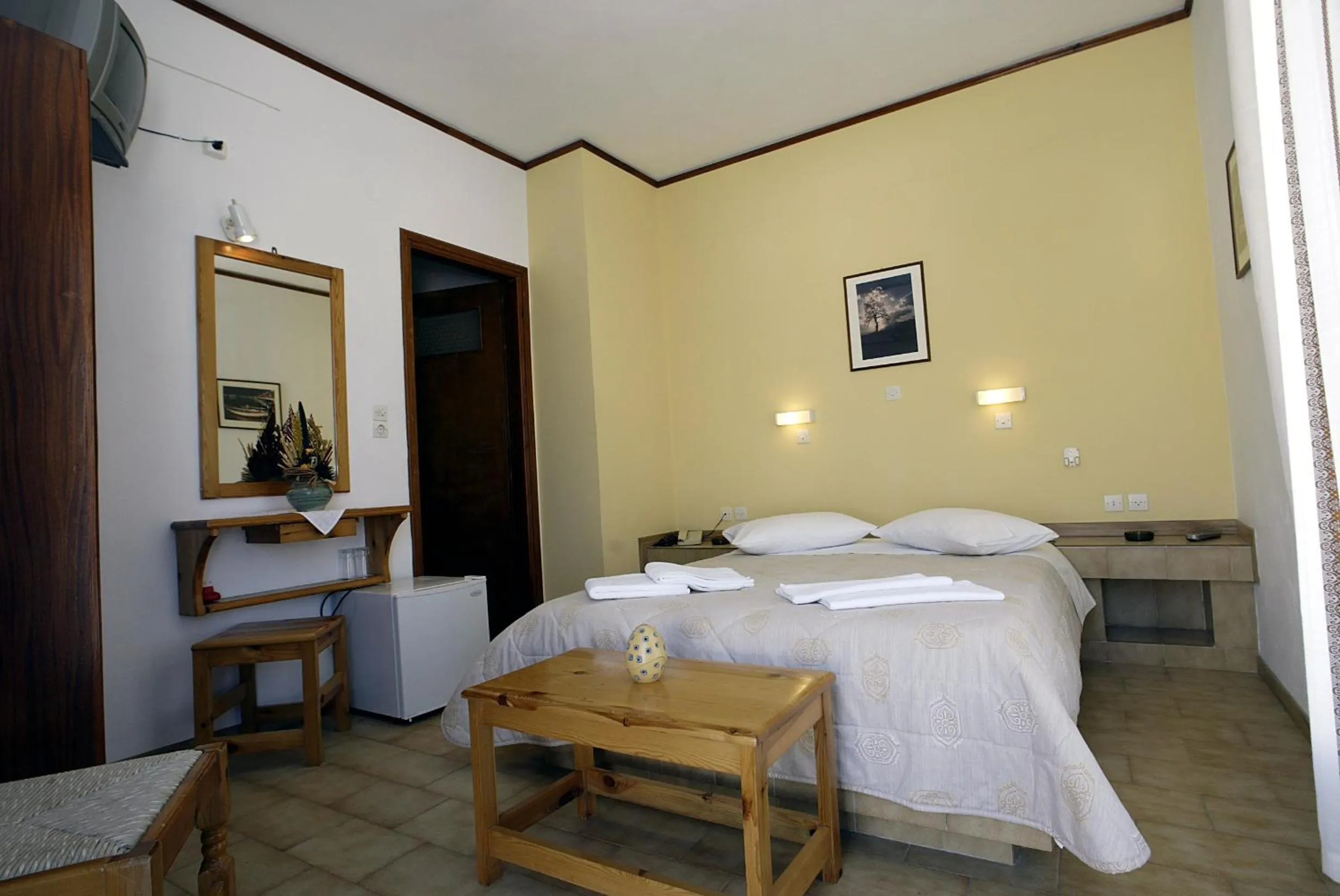 Bed in Poseidon Hotel