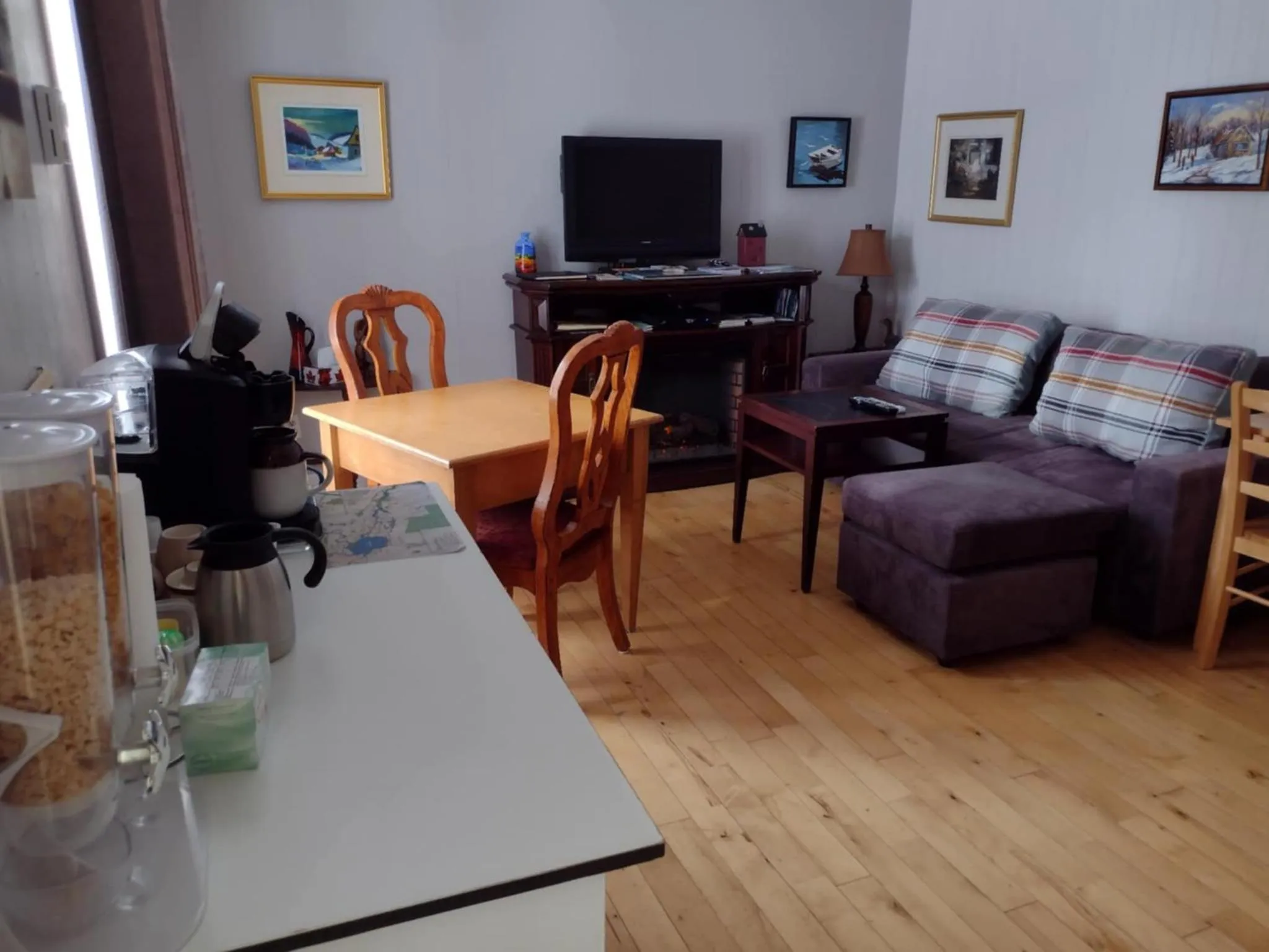 Communal lounge/ TV room in Gîte Marie-Claire