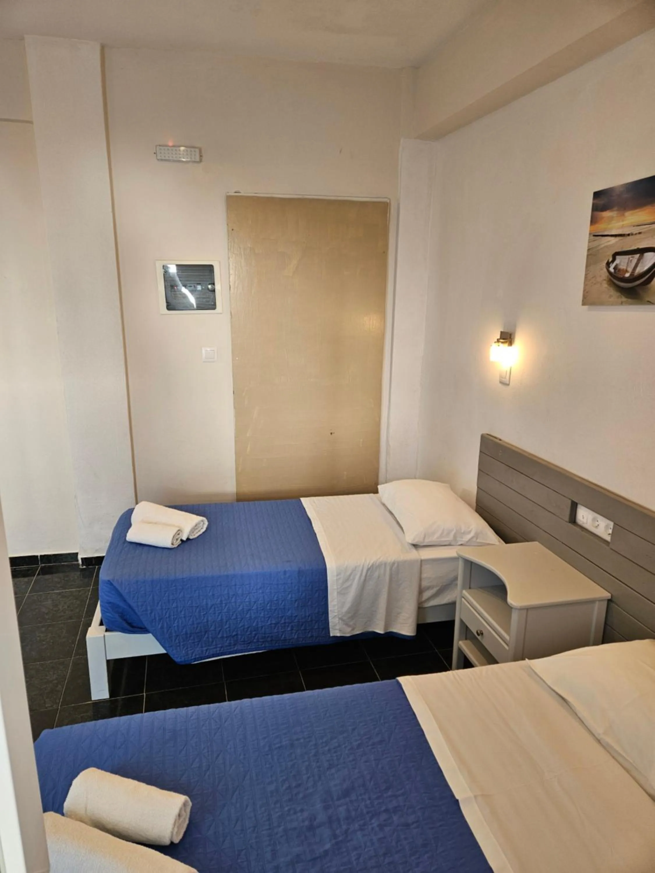 Bed in Skala Sunset Hotel and spa