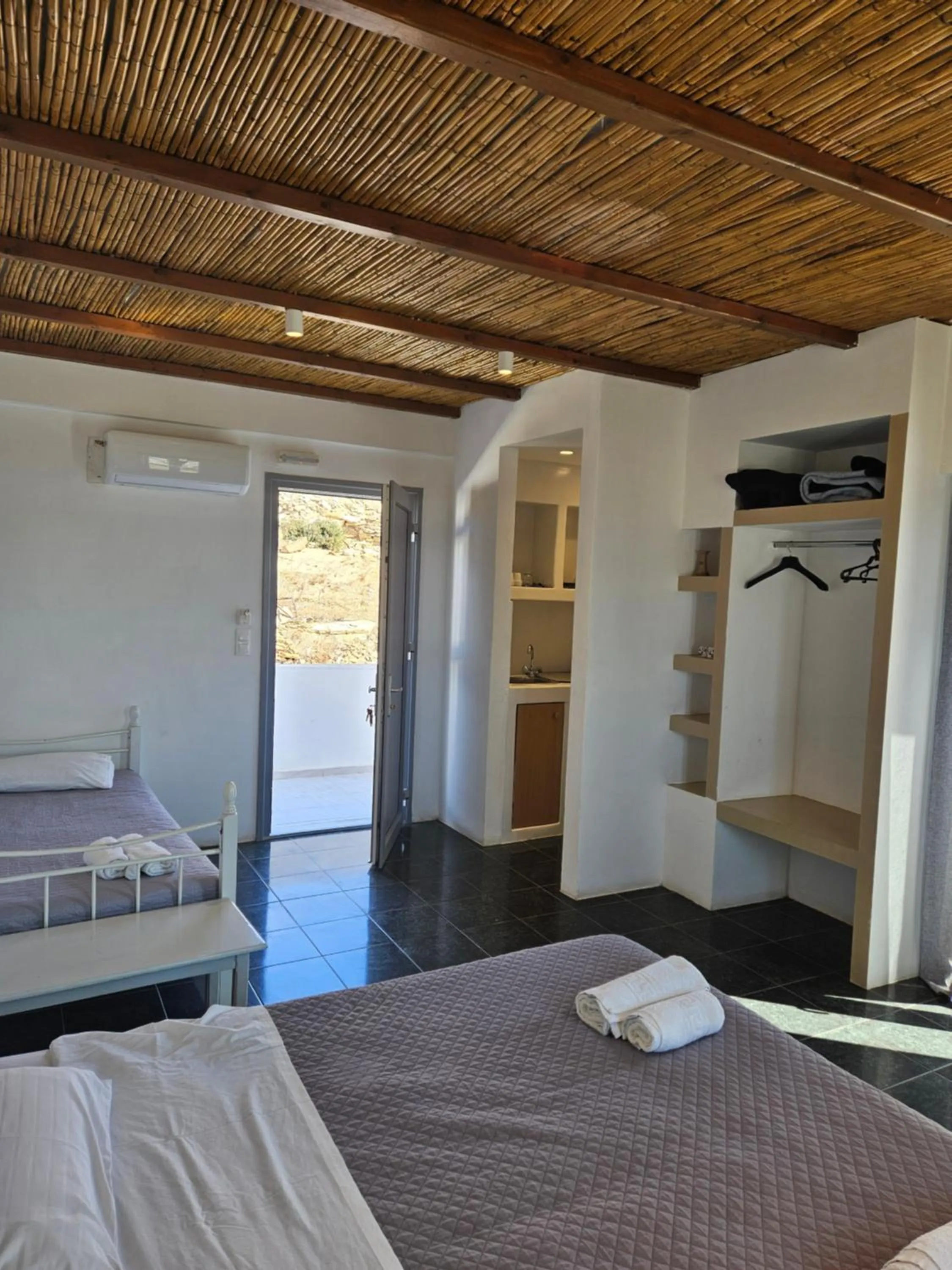 Bed in Skala Sunset Hotel and spa