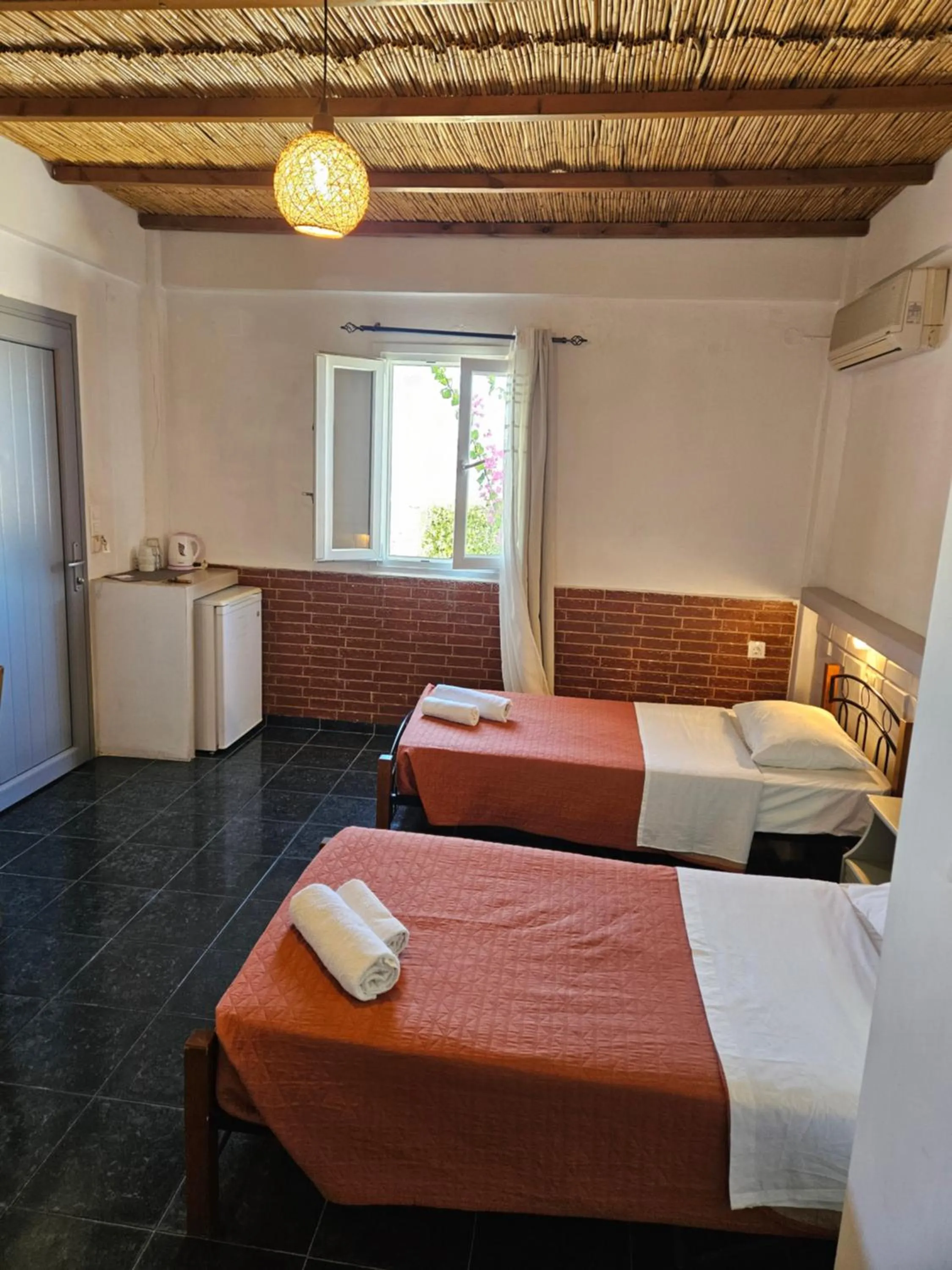 Bed in Skala Sunset Hotel and spa