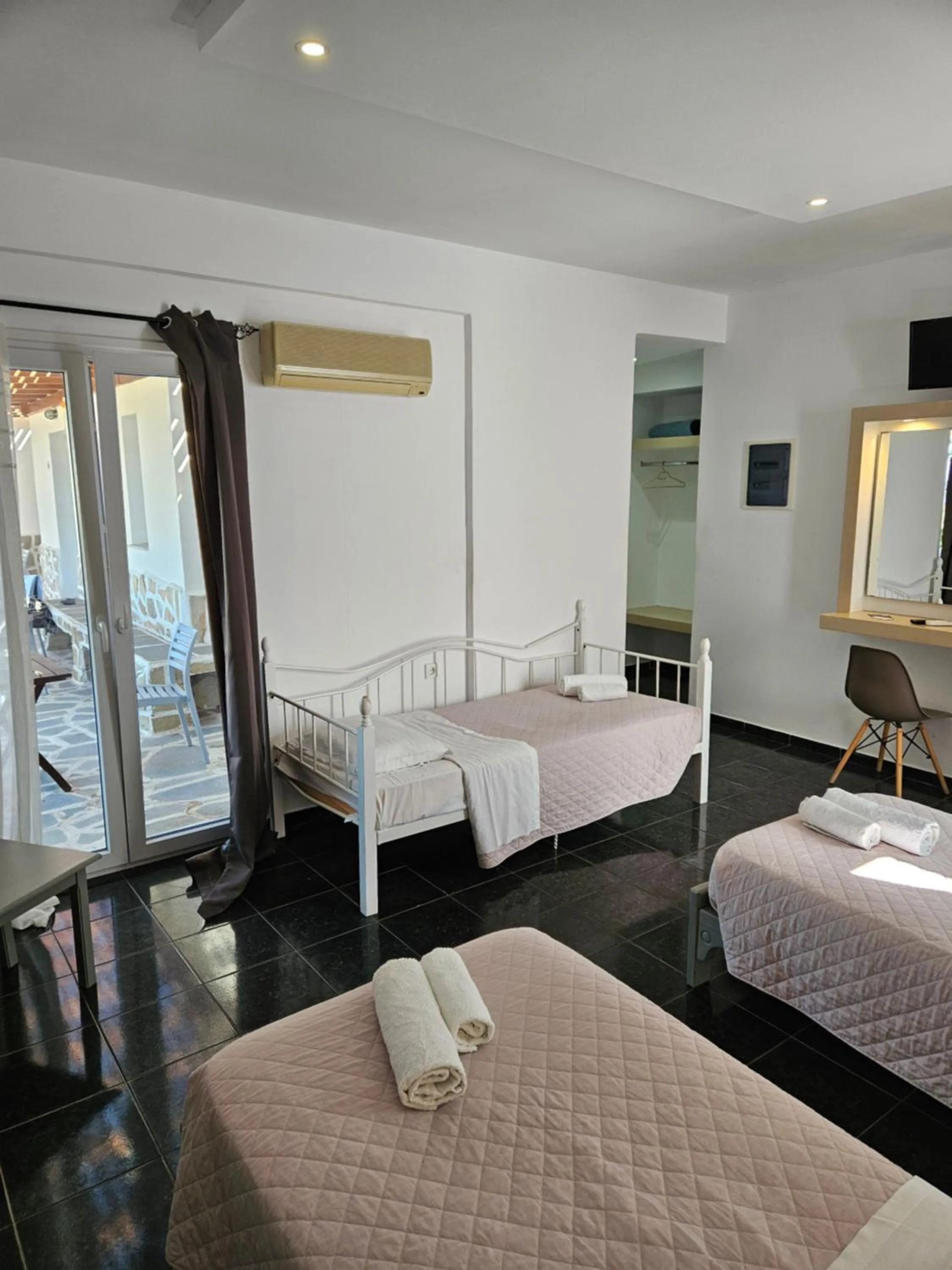 Bed in Skala Sunset Hotel and spa