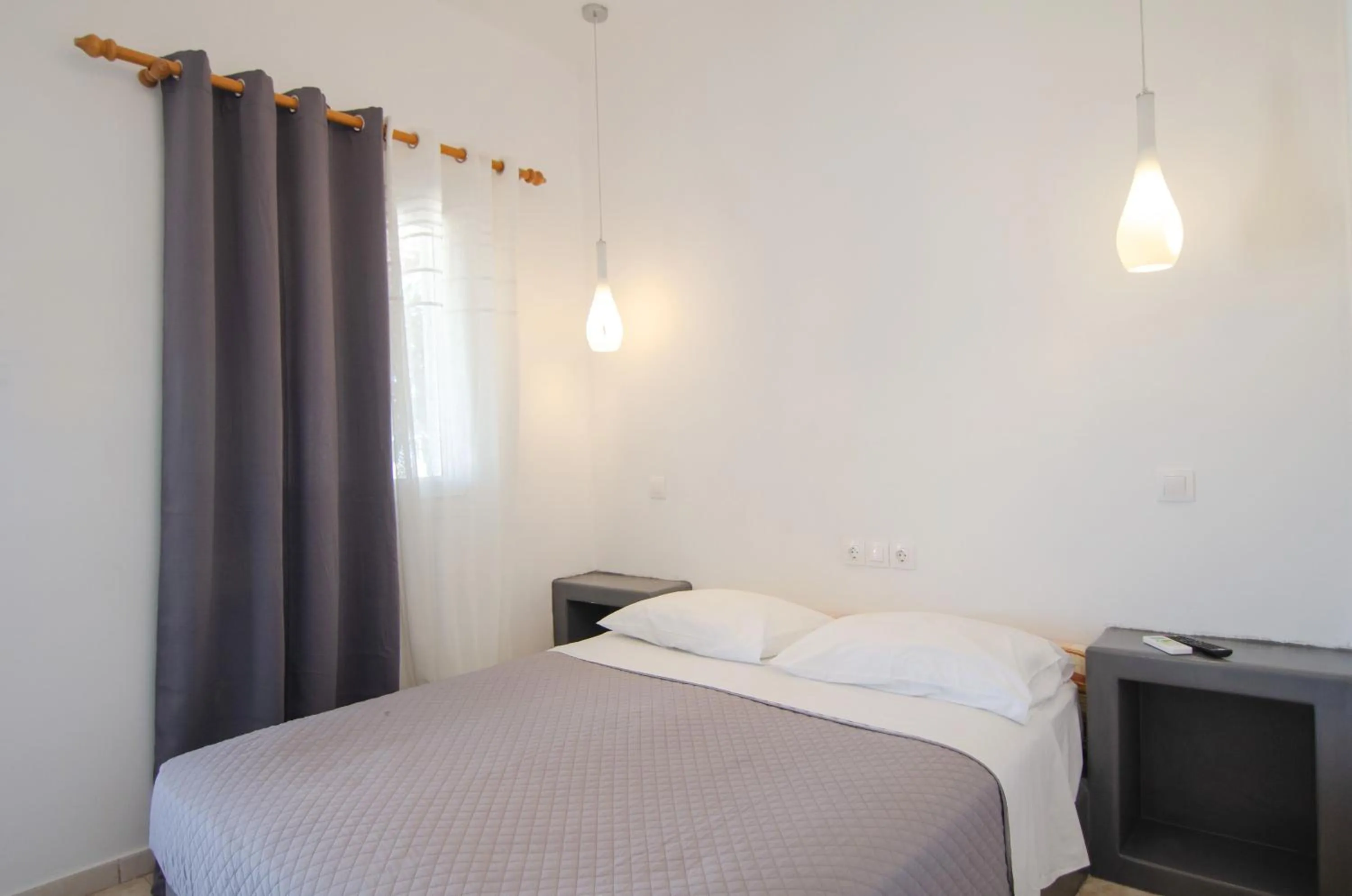 Bed in Skala Sunset Hotel and spa