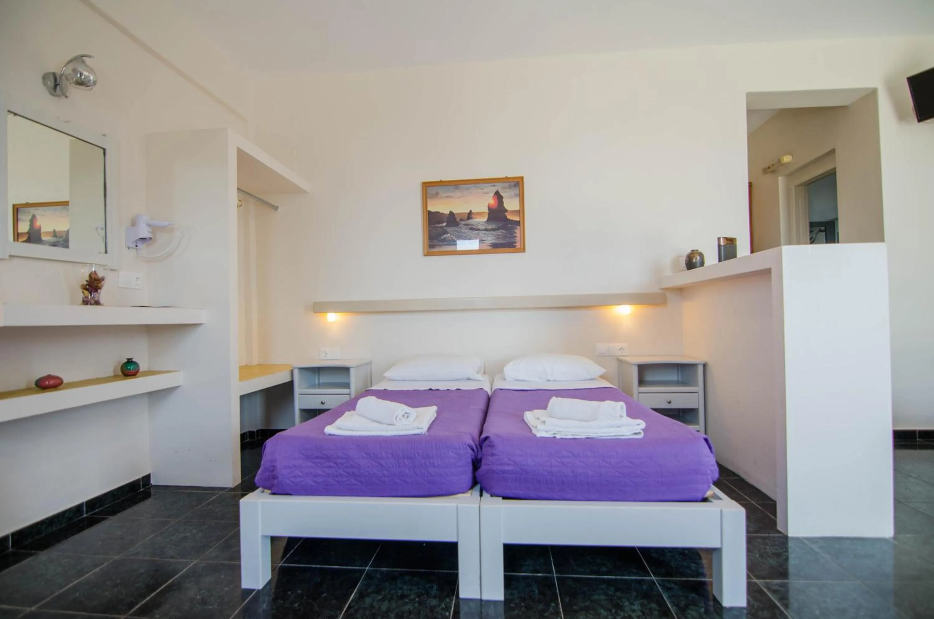 Bed in Skala Sunset Hotel and spa