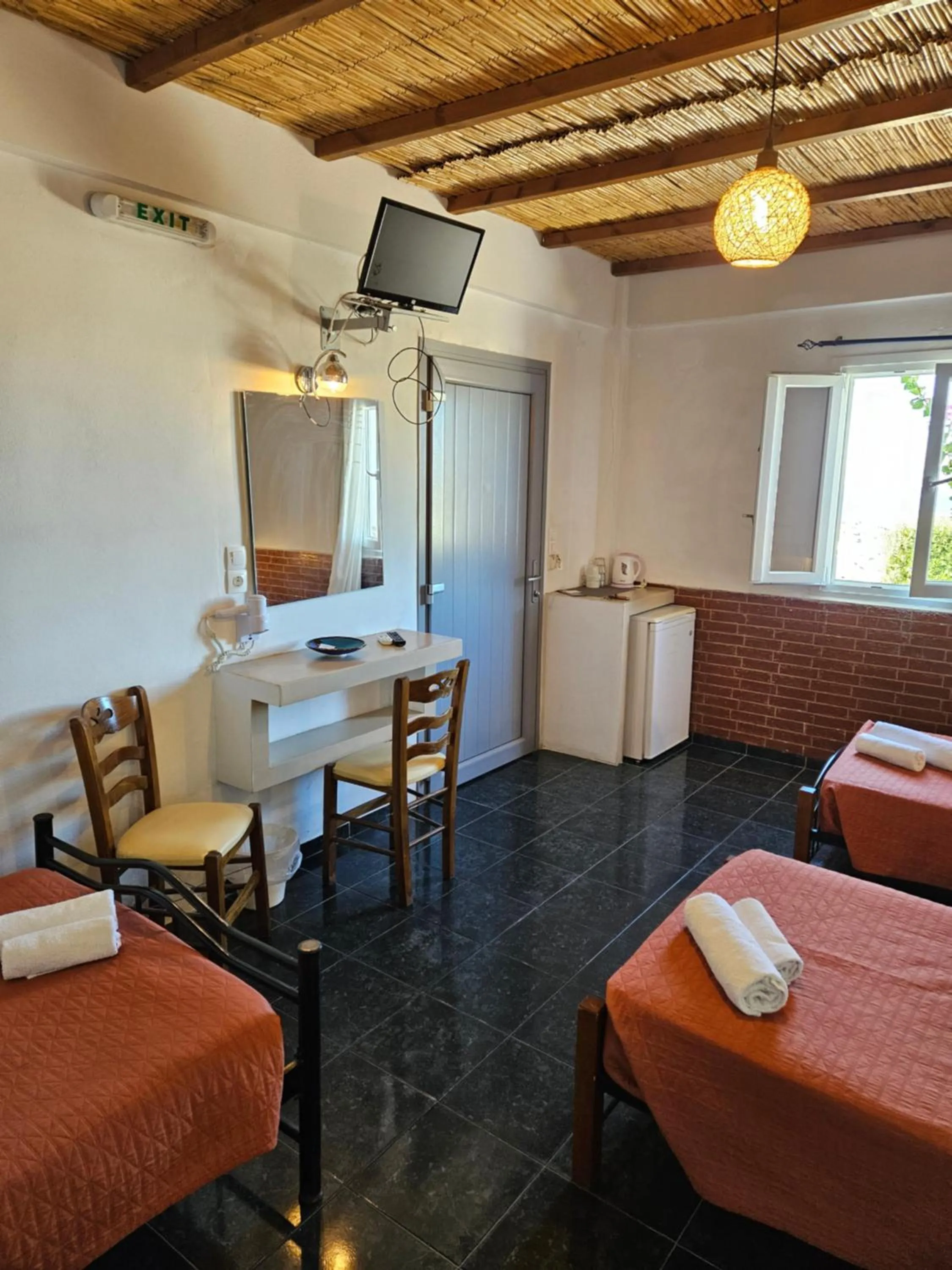 Bed in Skala Sunset Hotel and spa